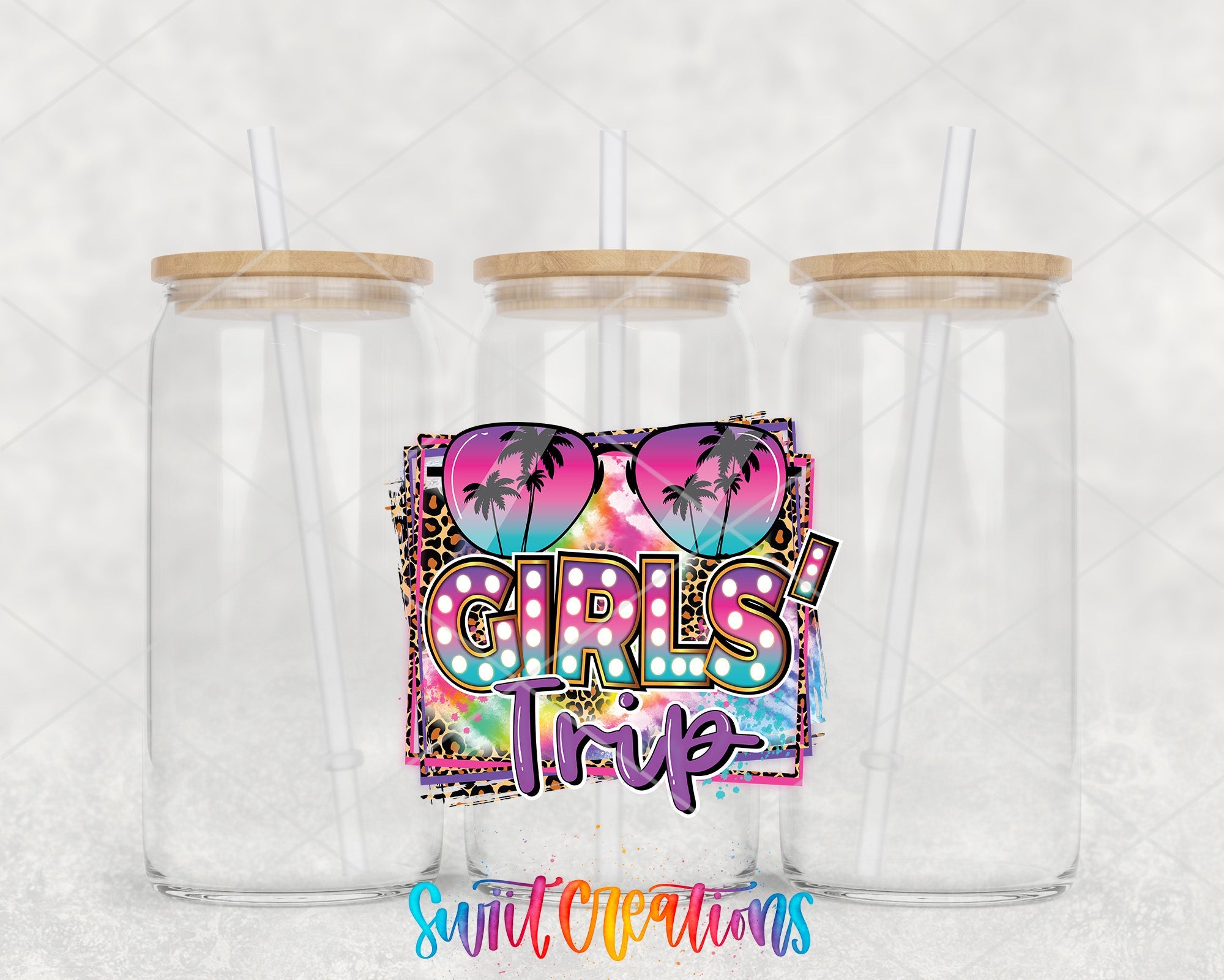 two clear tumblers with the words girls trip printed on them