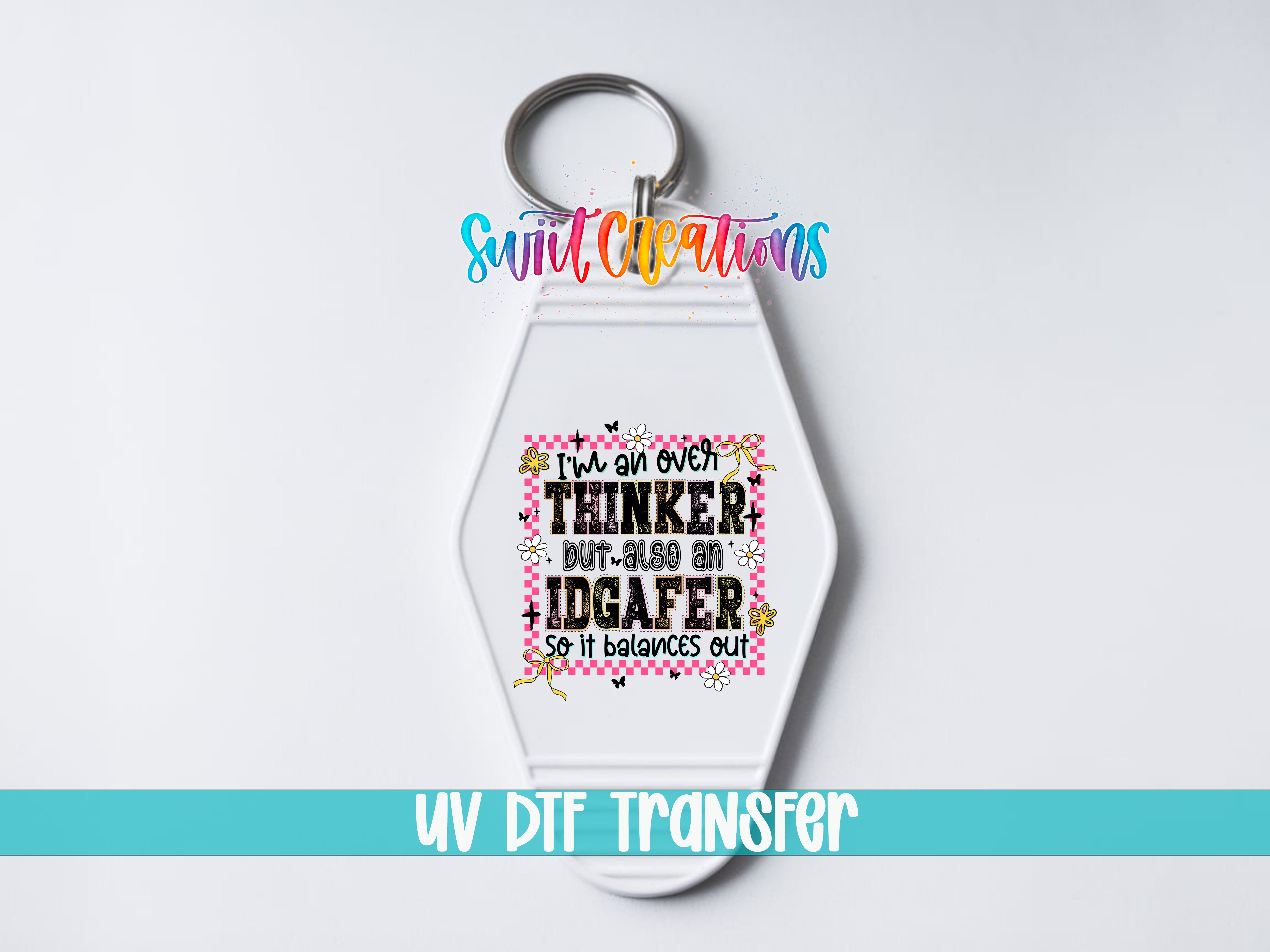 A keychain with a colorful design and text on it.