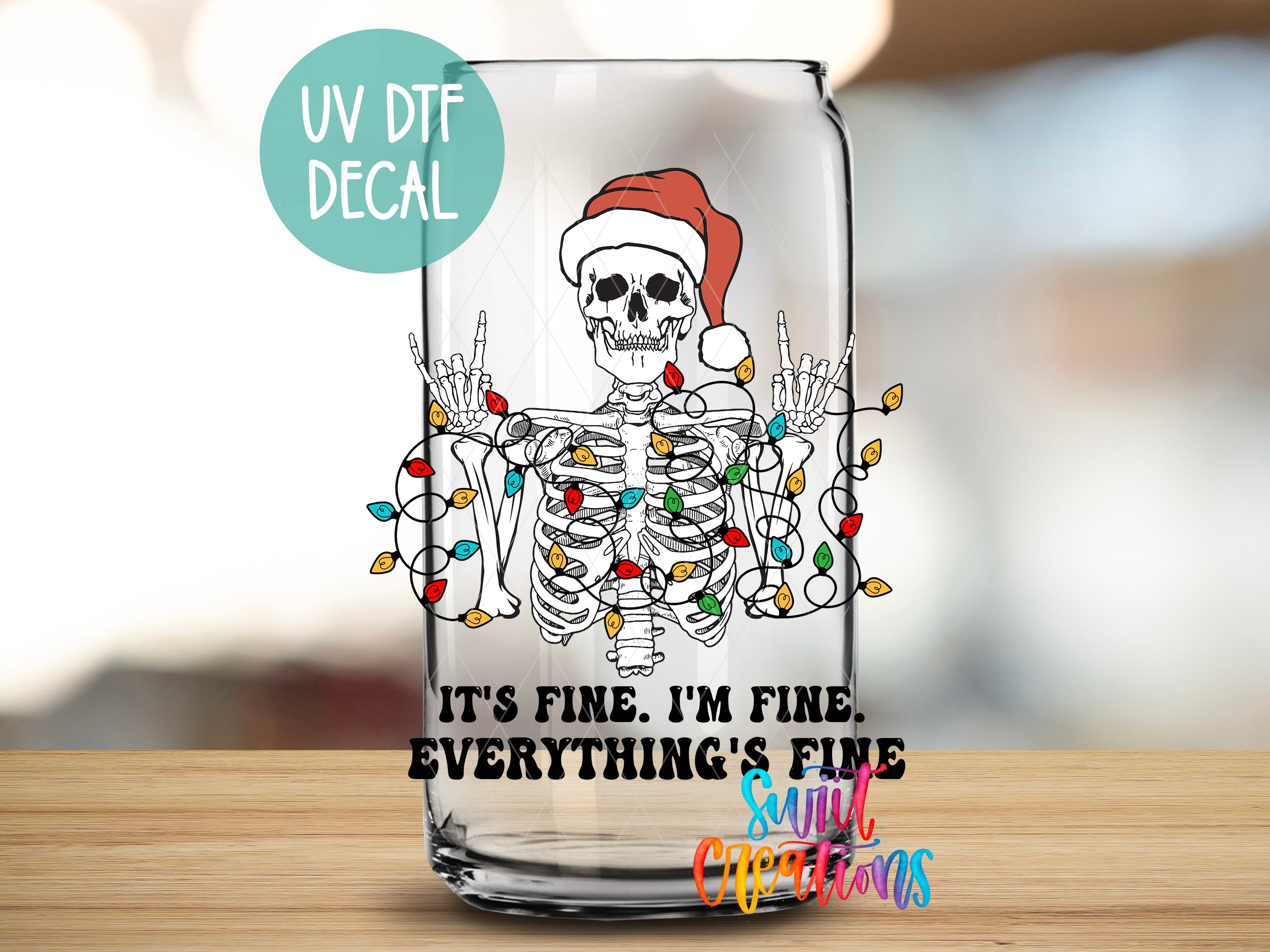 a glass with a skeleton wearing a santa hat