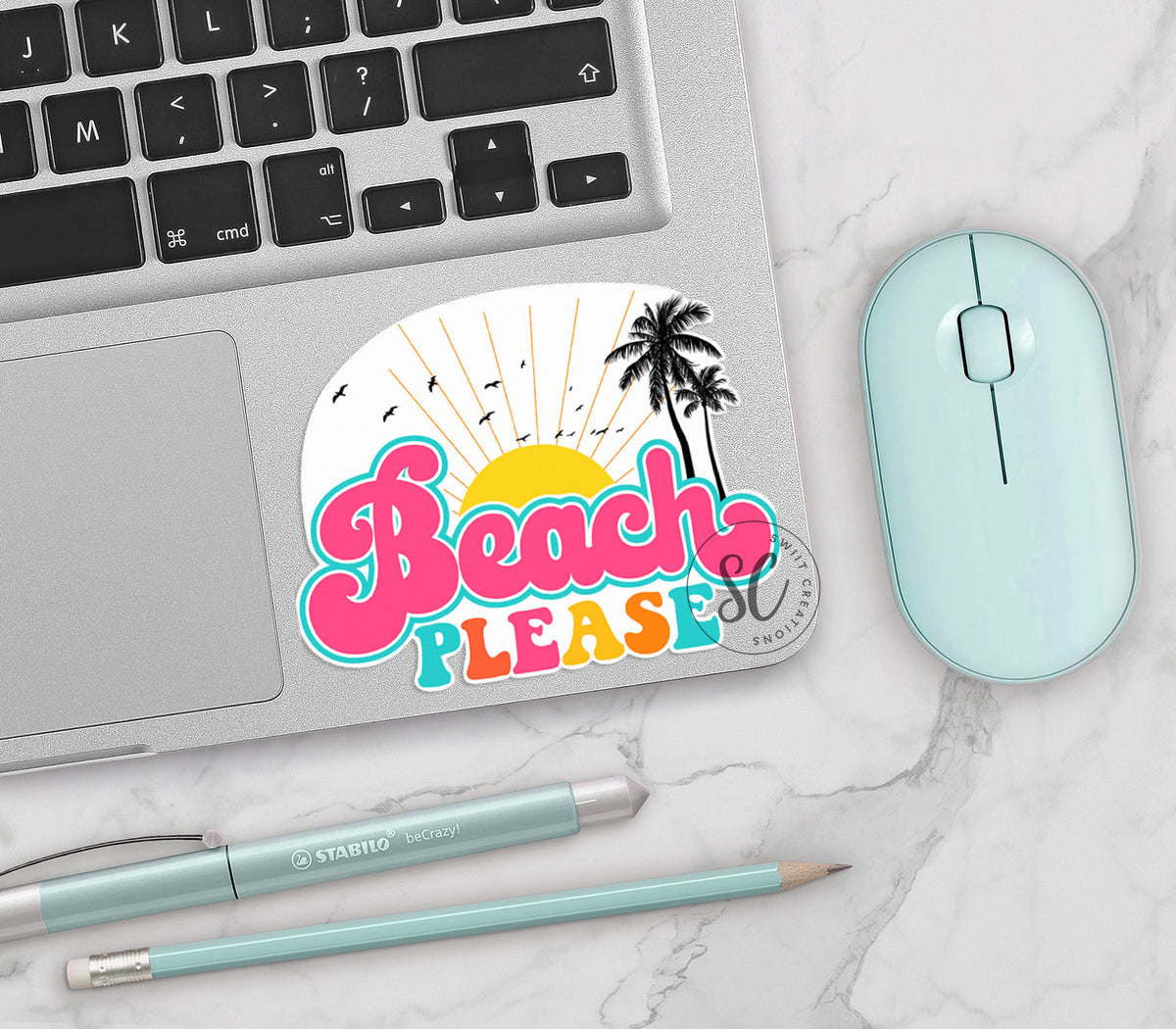 Beach Please vinyl sticker on a silver laptop next to a mint mouse and pens