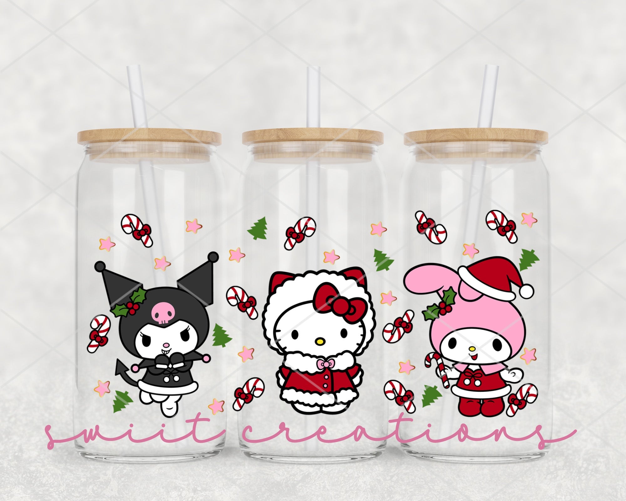 a couple of hello kitty glass cups sitting on top of a table