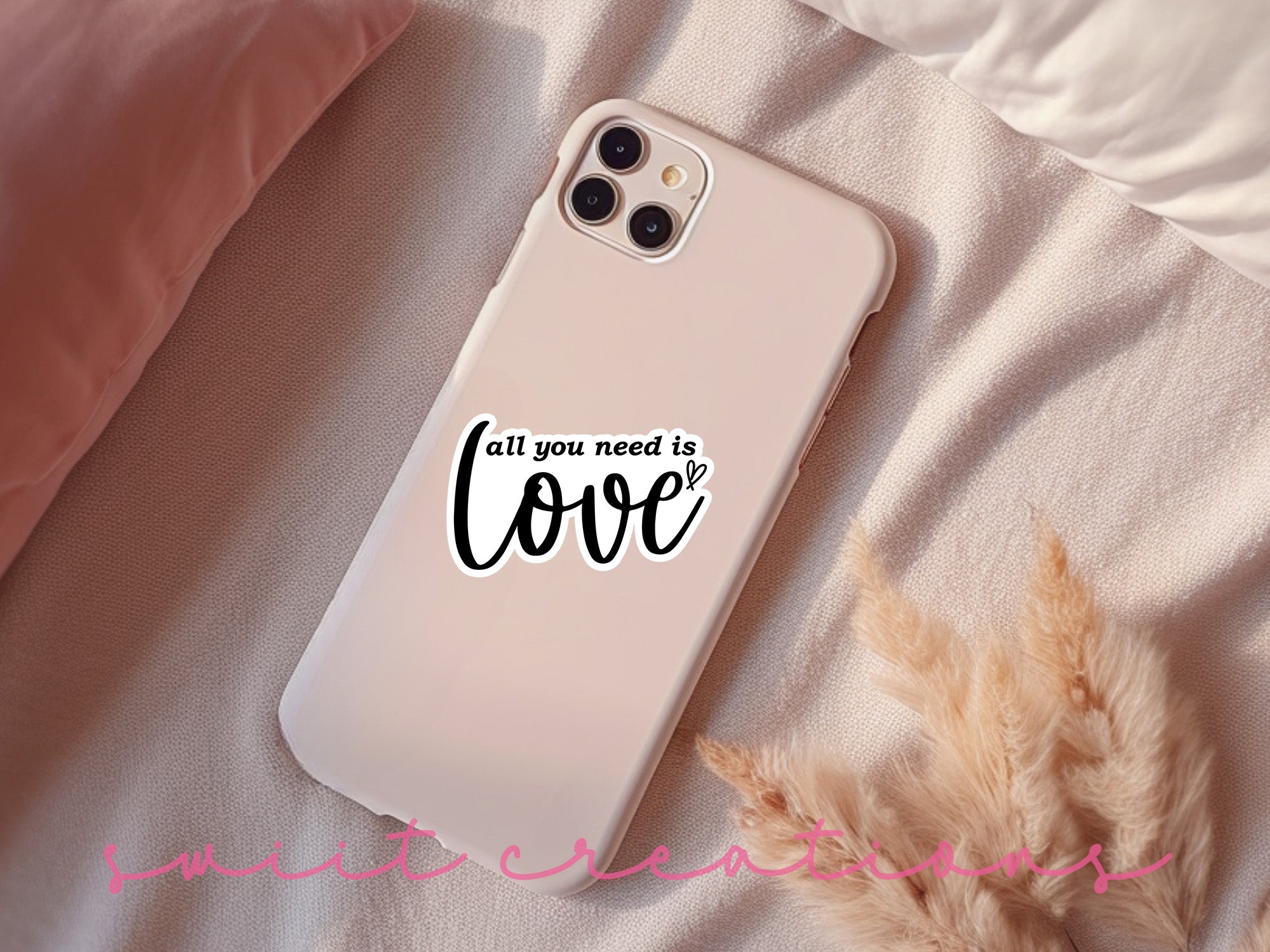 a phone case that says, all you need is love