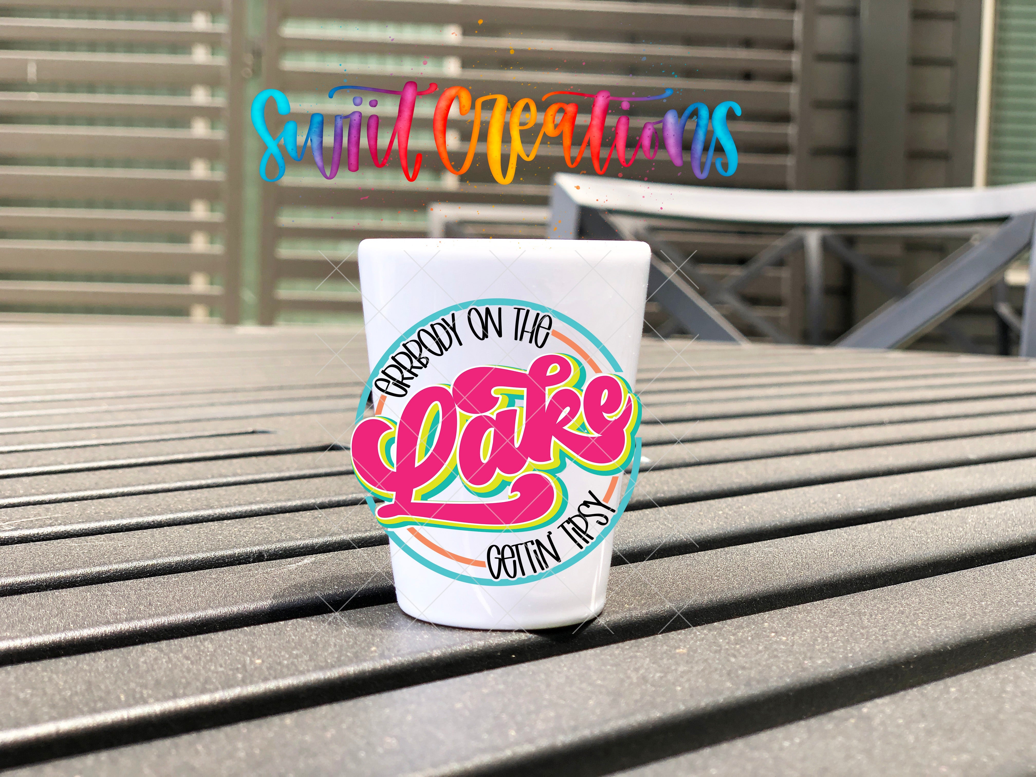 a cup of coffee sitting on top of a table