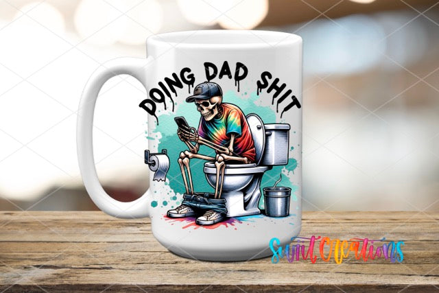 a white coffee mug with a painting of a man sitting on a toilet