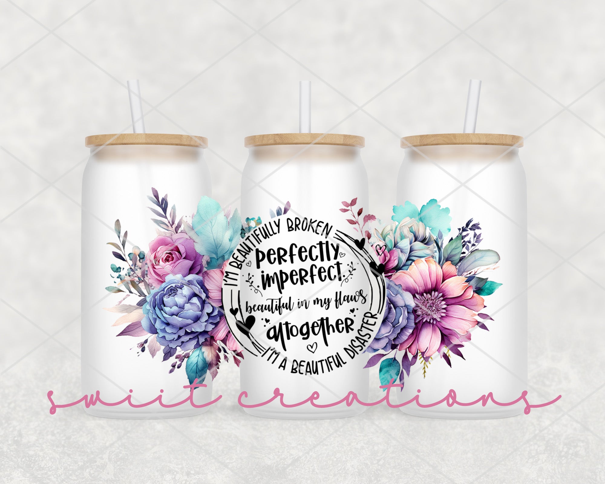 a couple of white mason jars with flowers on them