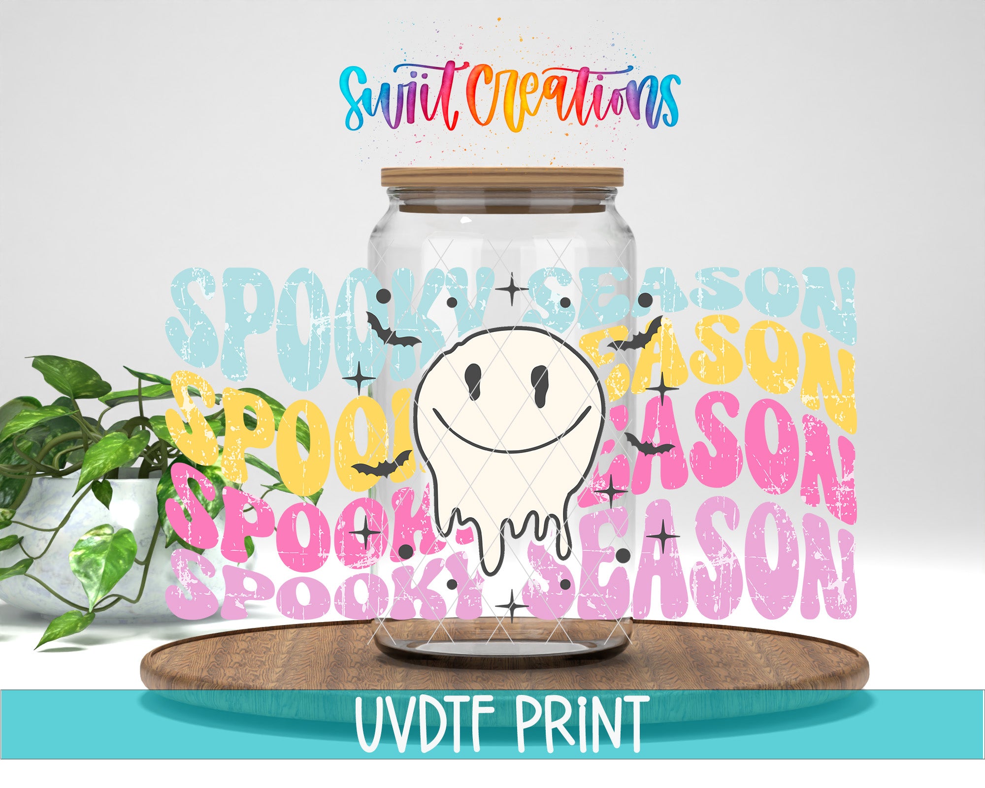 a glass jar with a smiling ghost inside, surrounded by the text "SPOOKY SEASON" in various colors and styles.