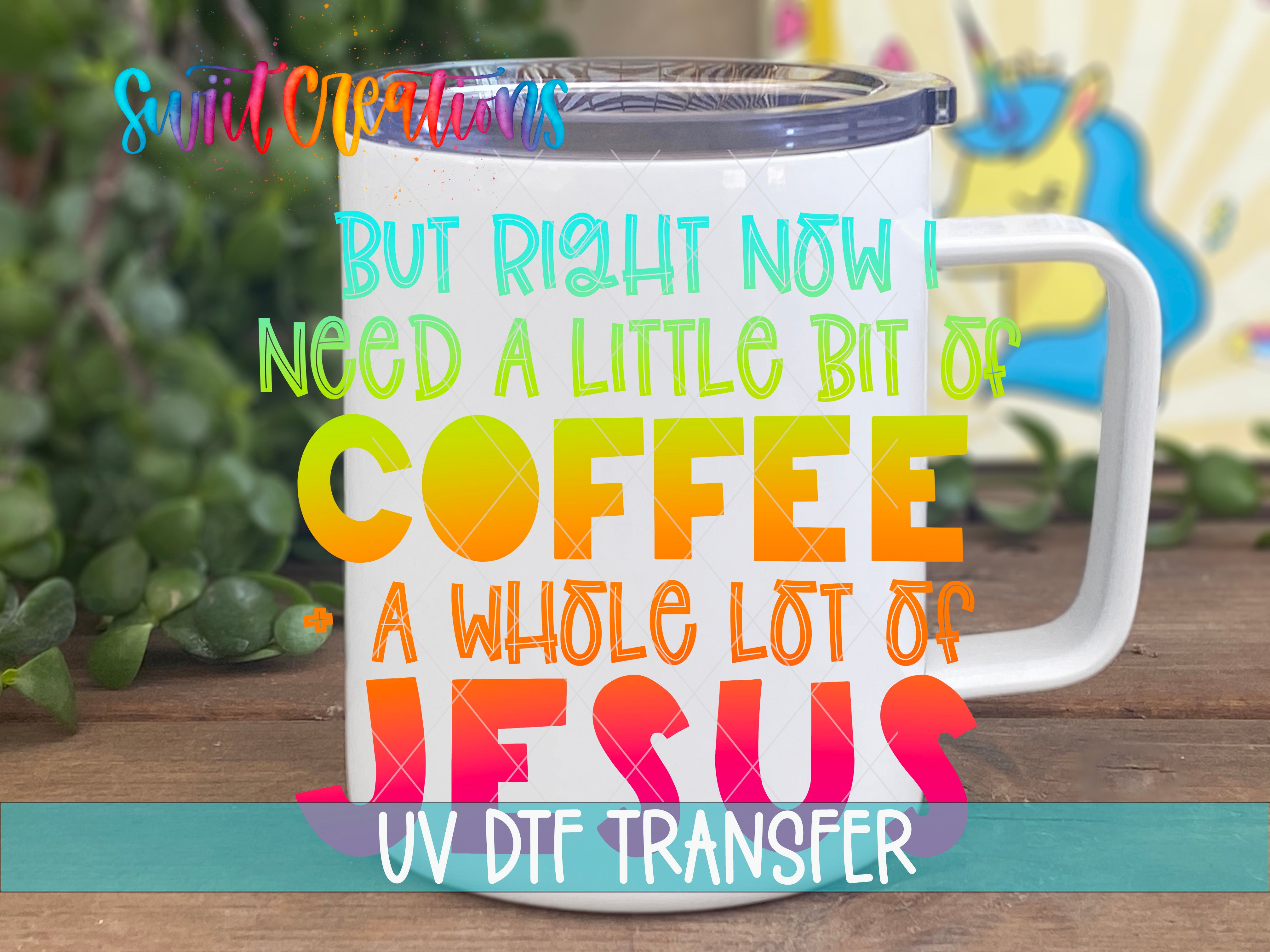 A white mug with colorful text on it, placed on a wooden surface.