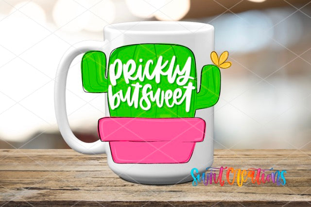 a coffee mug with a cactus on it