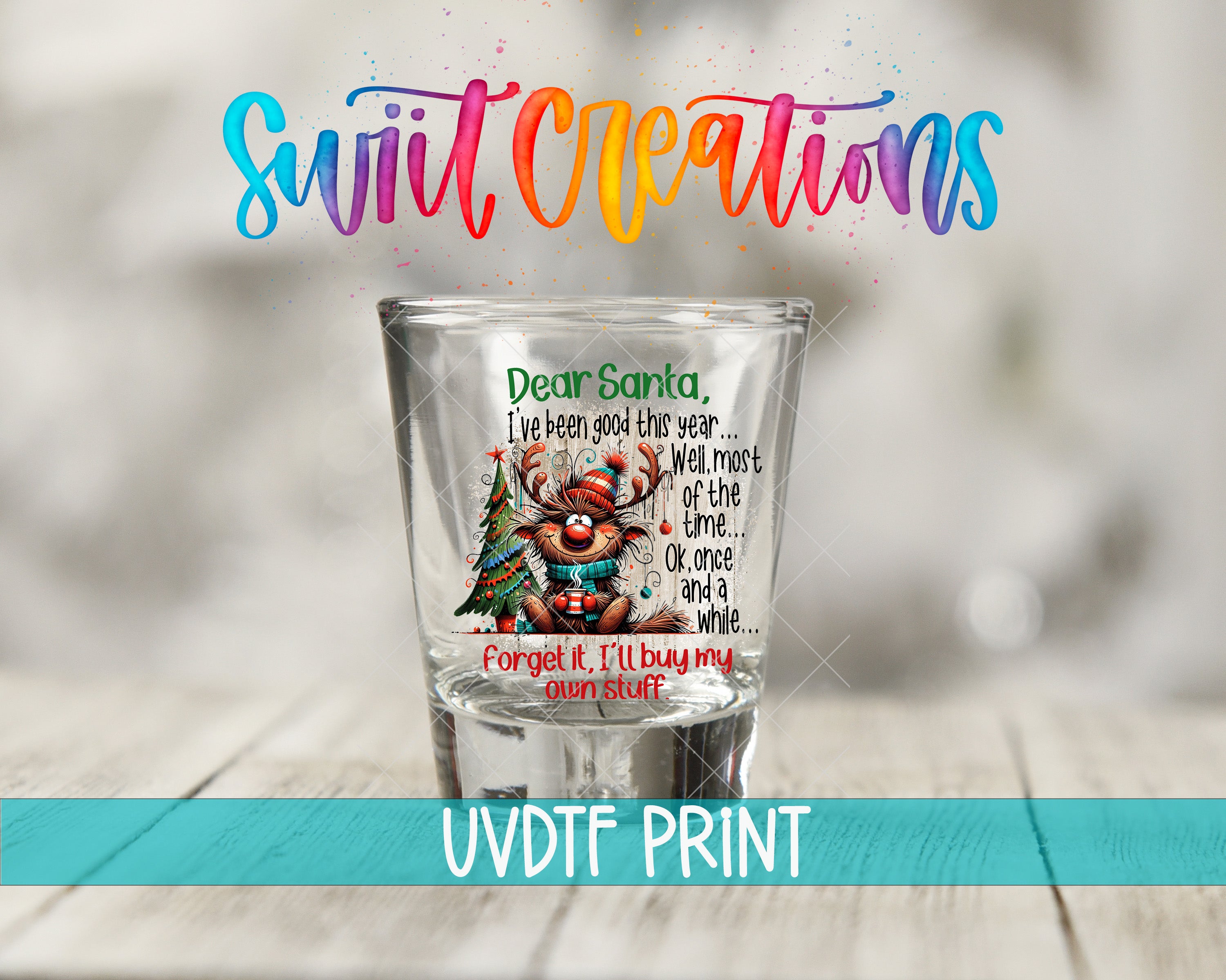 a shot glass with a colorful, whimsical design and text, including a Santa Claus character and a message about buying one's own stuff.