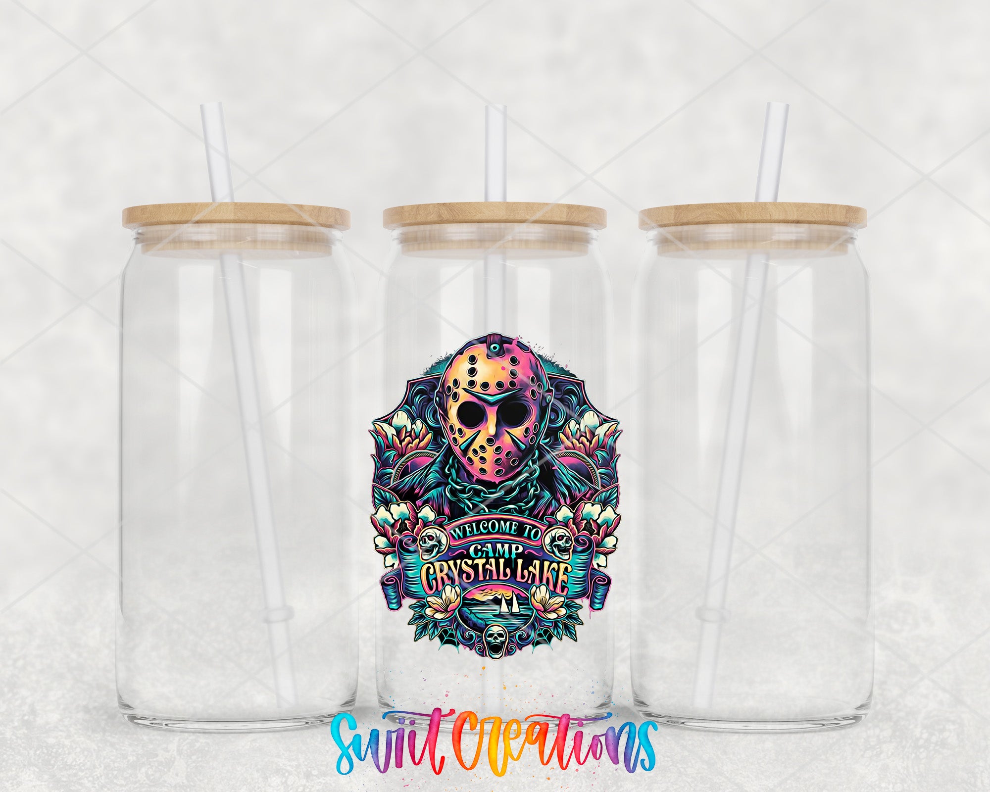 two clear tumblers with a colorful skull on them
