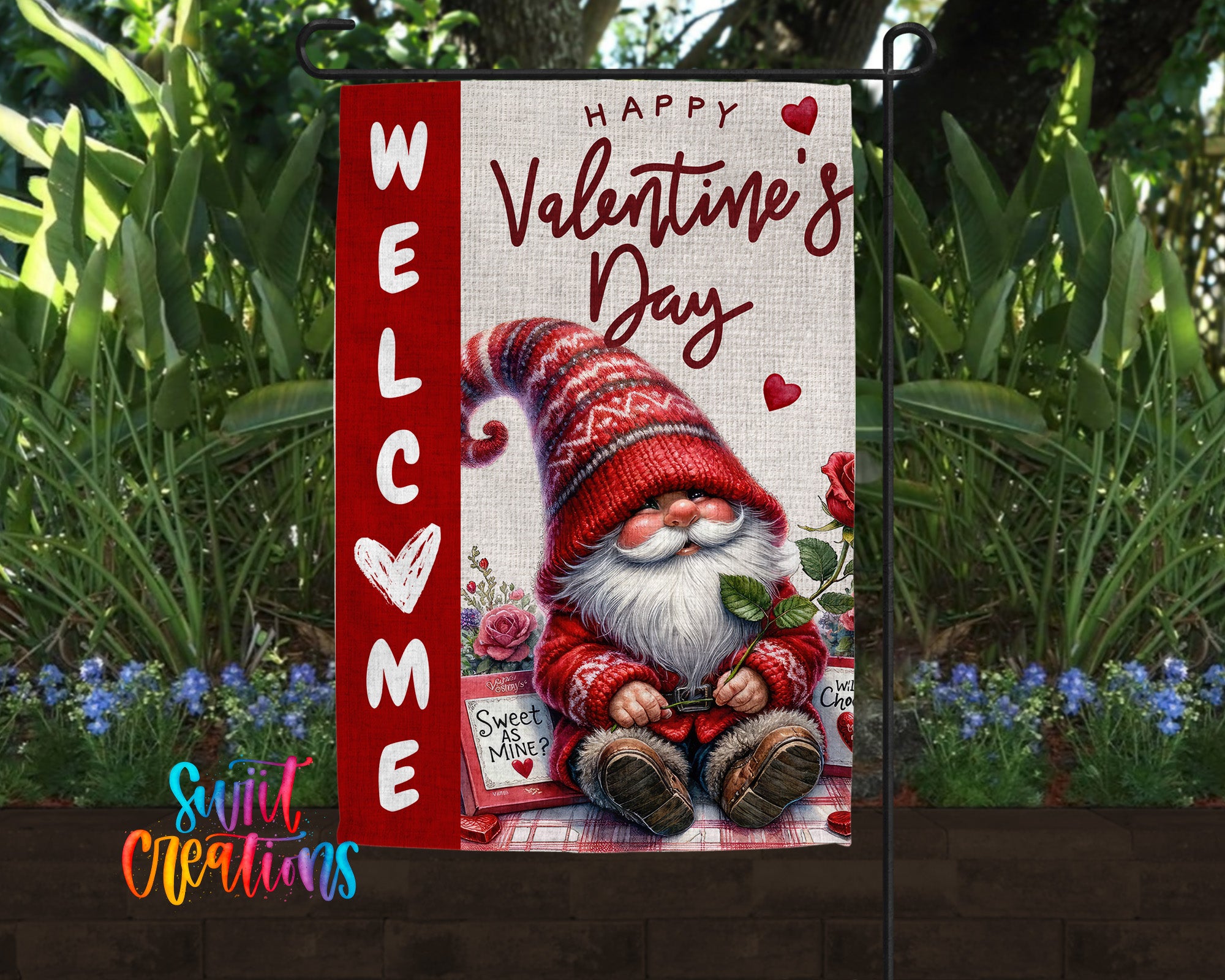 A garden sign featuring a red and white gnome wearing a red sweater and holding a rose, with the text "Welcome to Valentine's Day" and "Happy Valentine's Day" displayed.