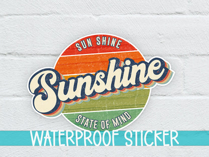 Sunshine State of Mind sticker on a white brick background with a waterproof sticker banner