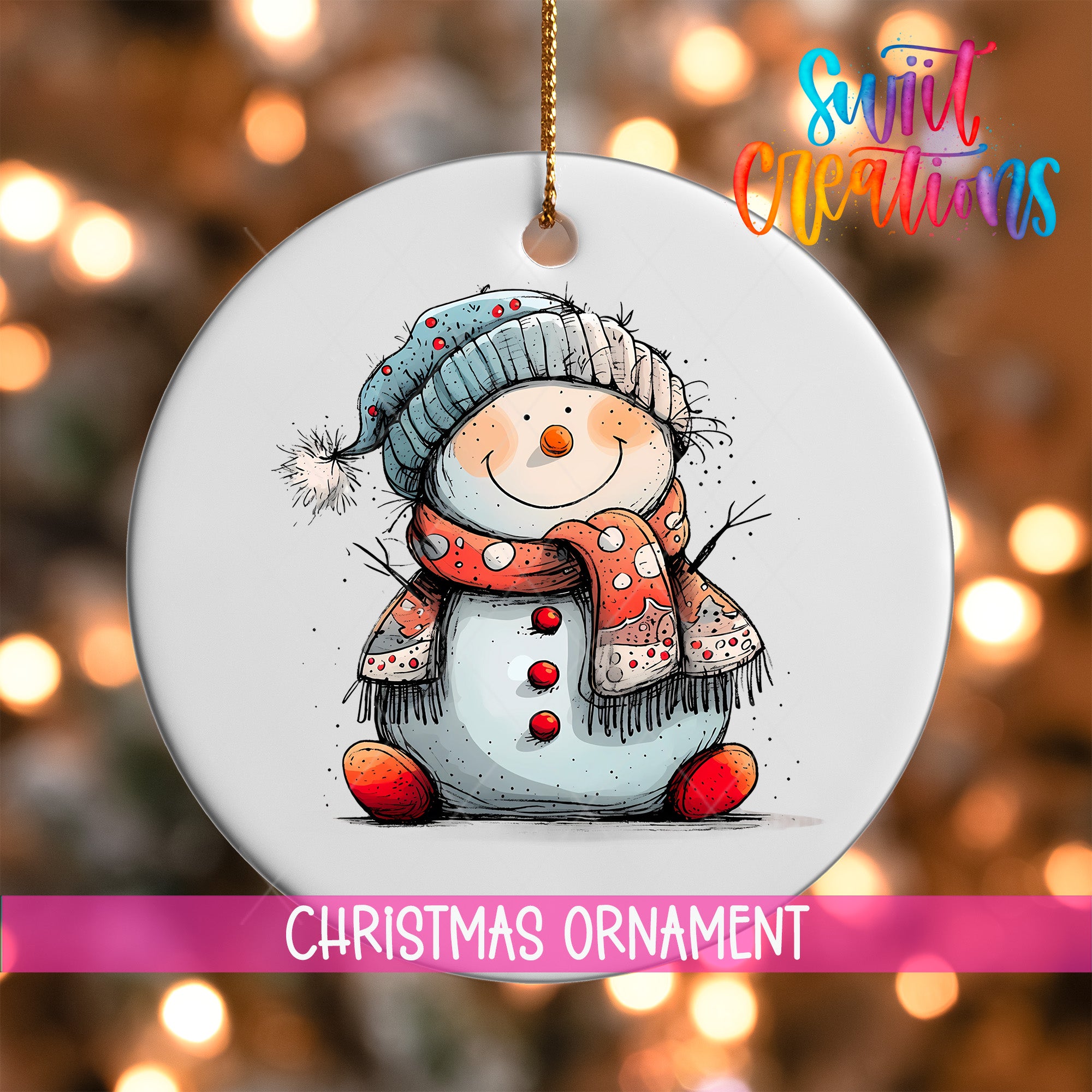 A white Christmas ornament featuring a smiling snowman wearing a red scarf and hat, with a background of colorful lights.