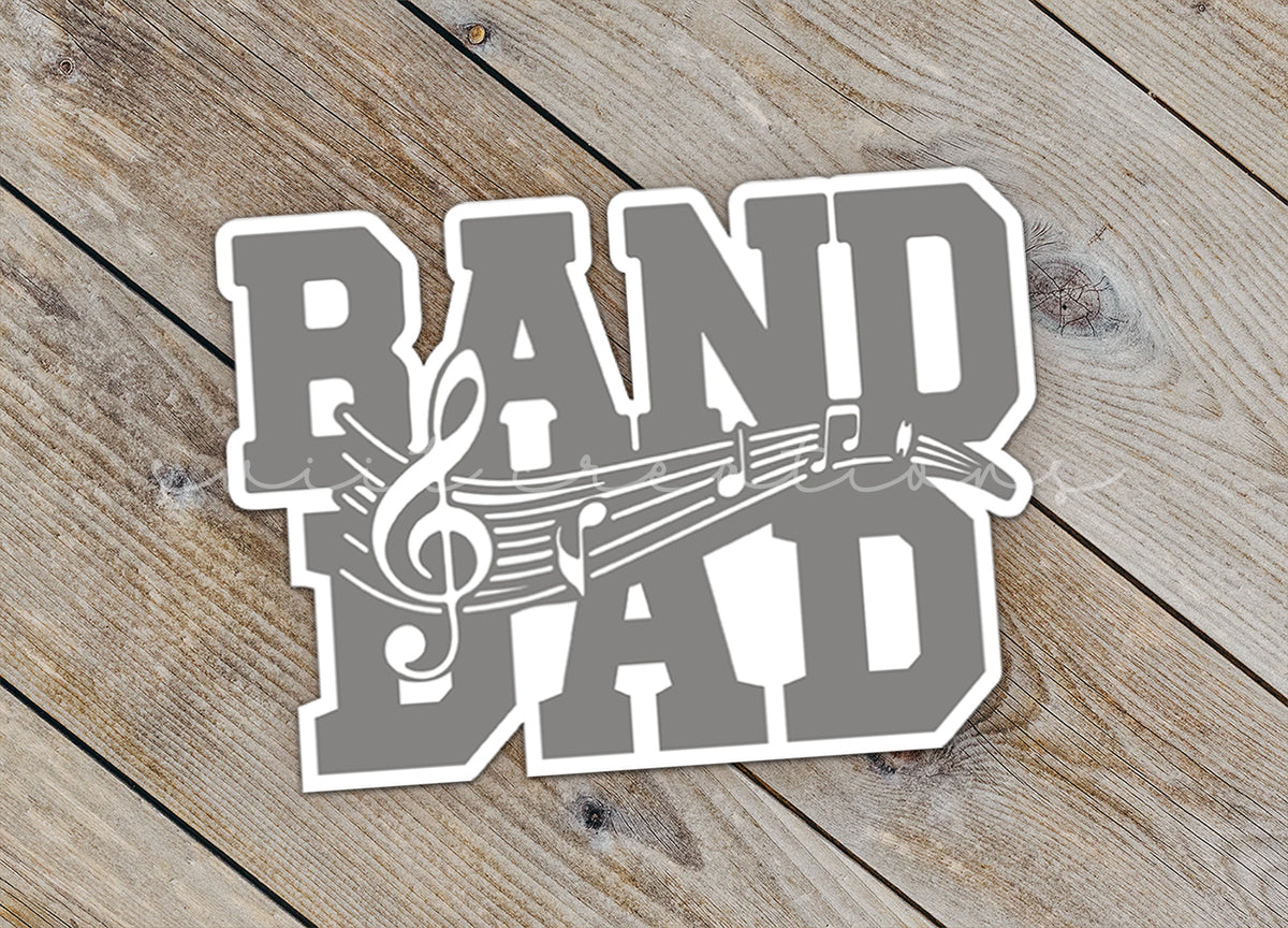 a sticker that says band dad on it