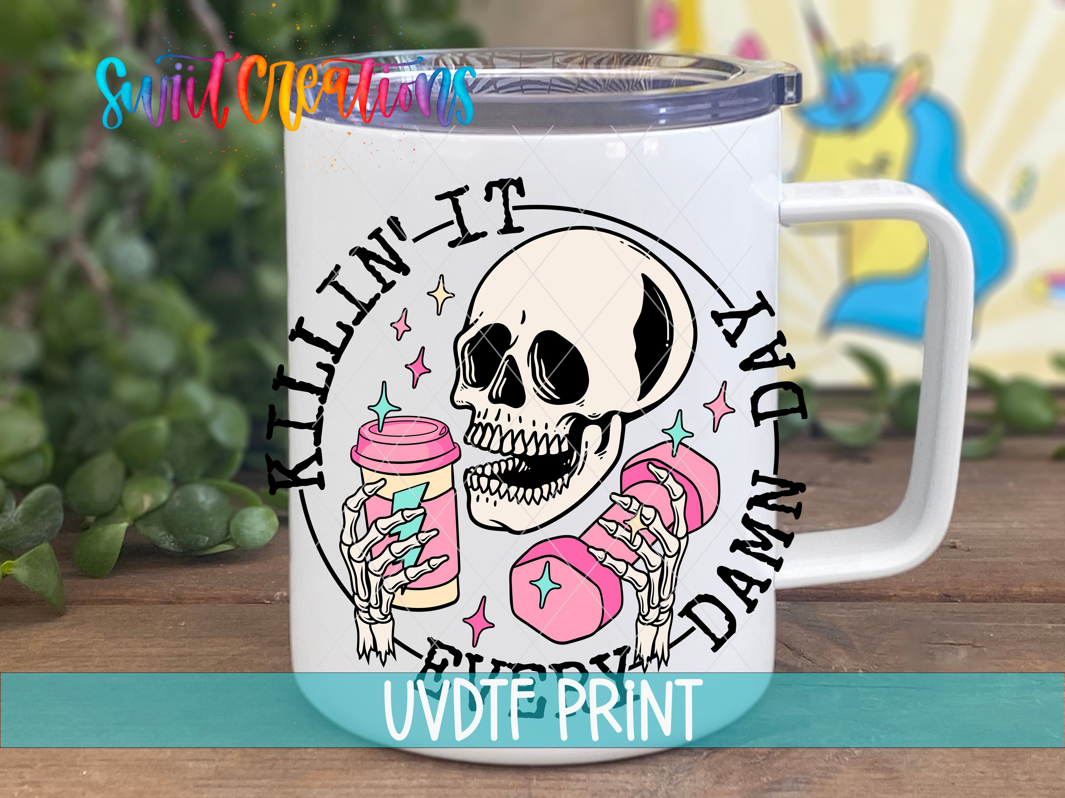 a white coffee mug with a skull holding a cup of ice cream