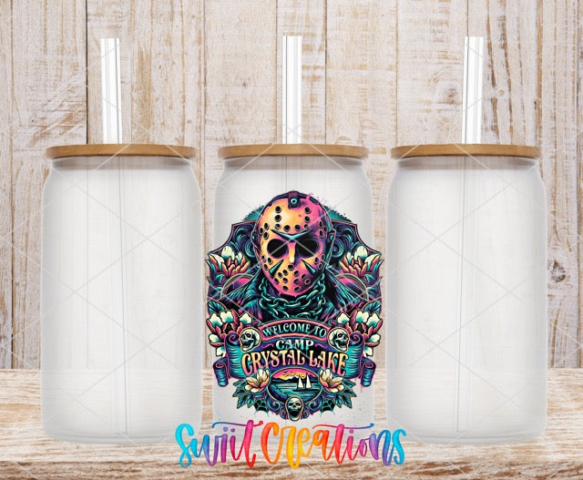 two white tumbles with a colorful sugar skull on them