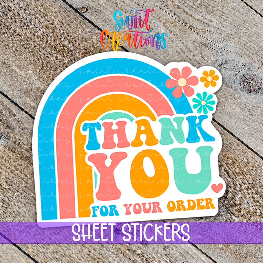 a thank you sticker with a rainbow and flowers