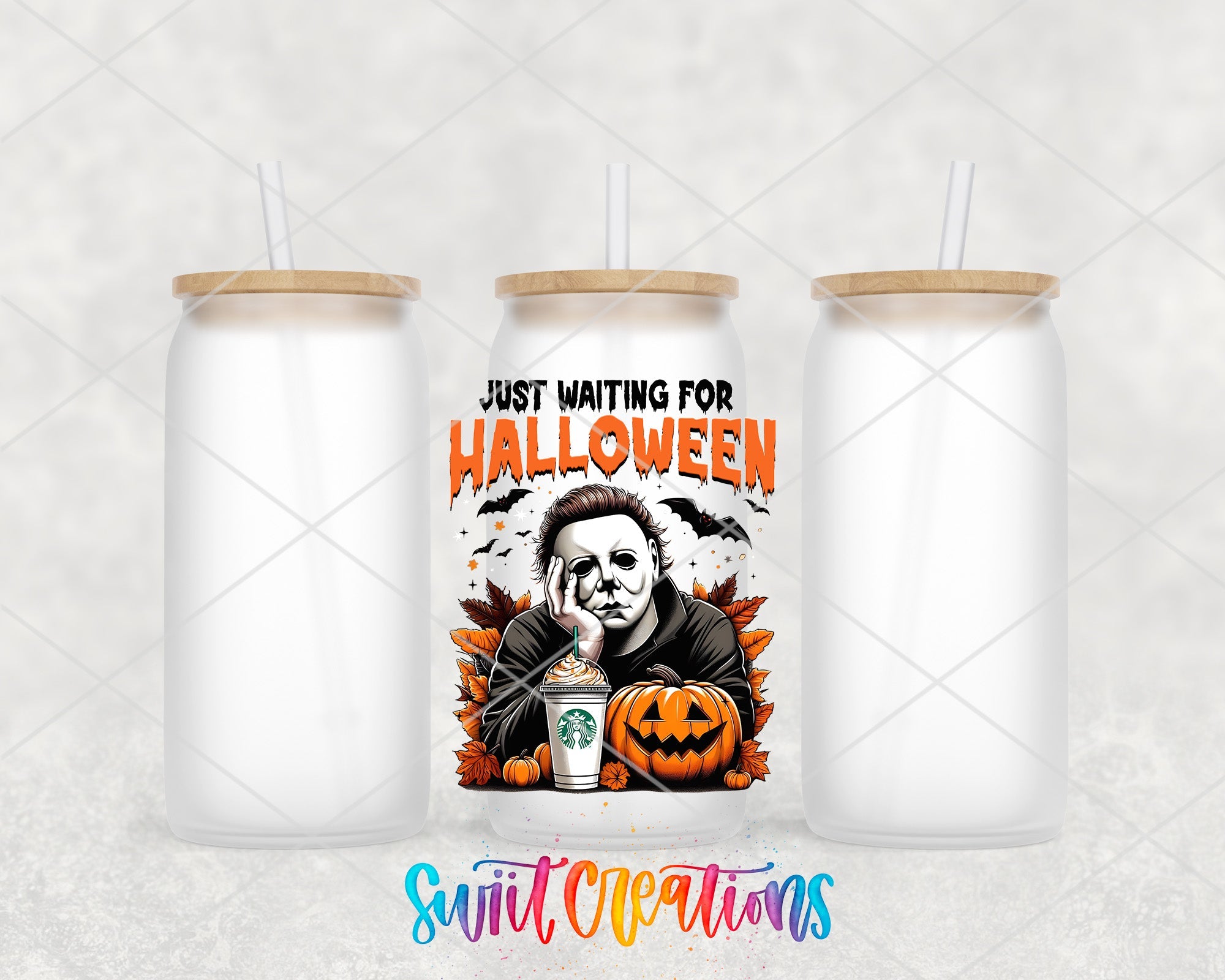 a couple of cups with a halloween design on them