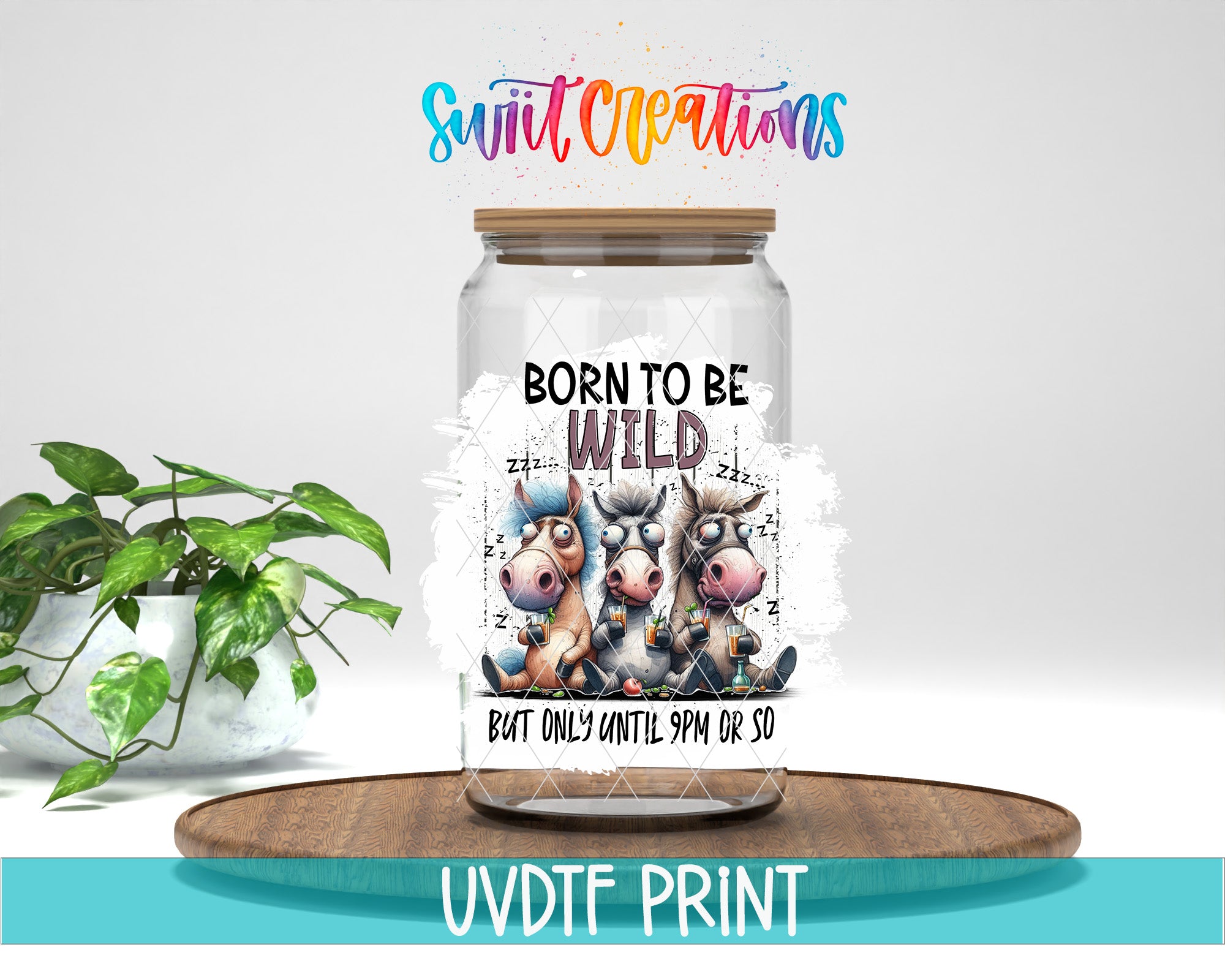 A glass jar with a label featuring cartoon cows and the text "Born to be wild" is displayed on a wooden surface, with a potted plant in the background.
