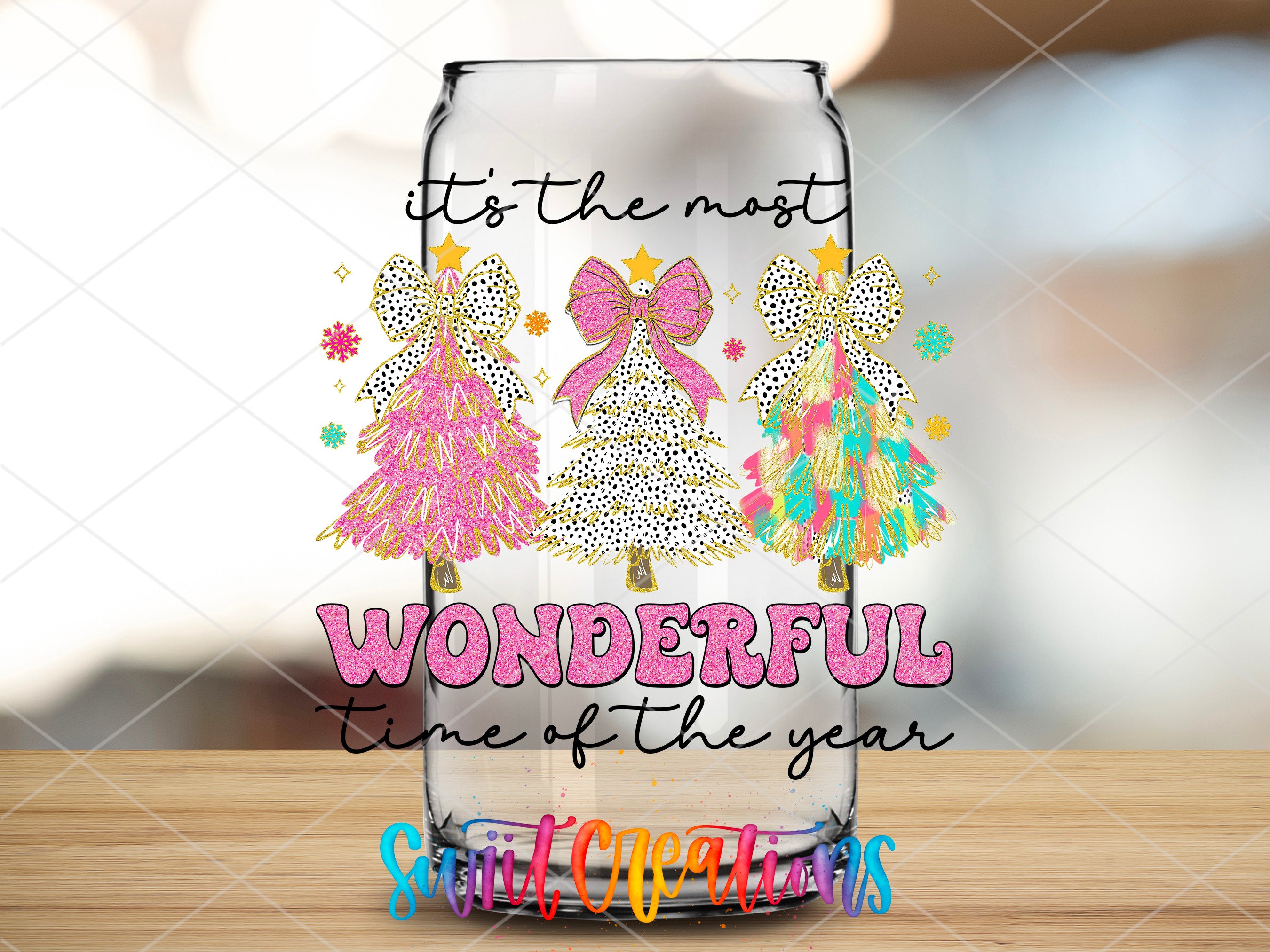 a clear glass with a colorful design on it