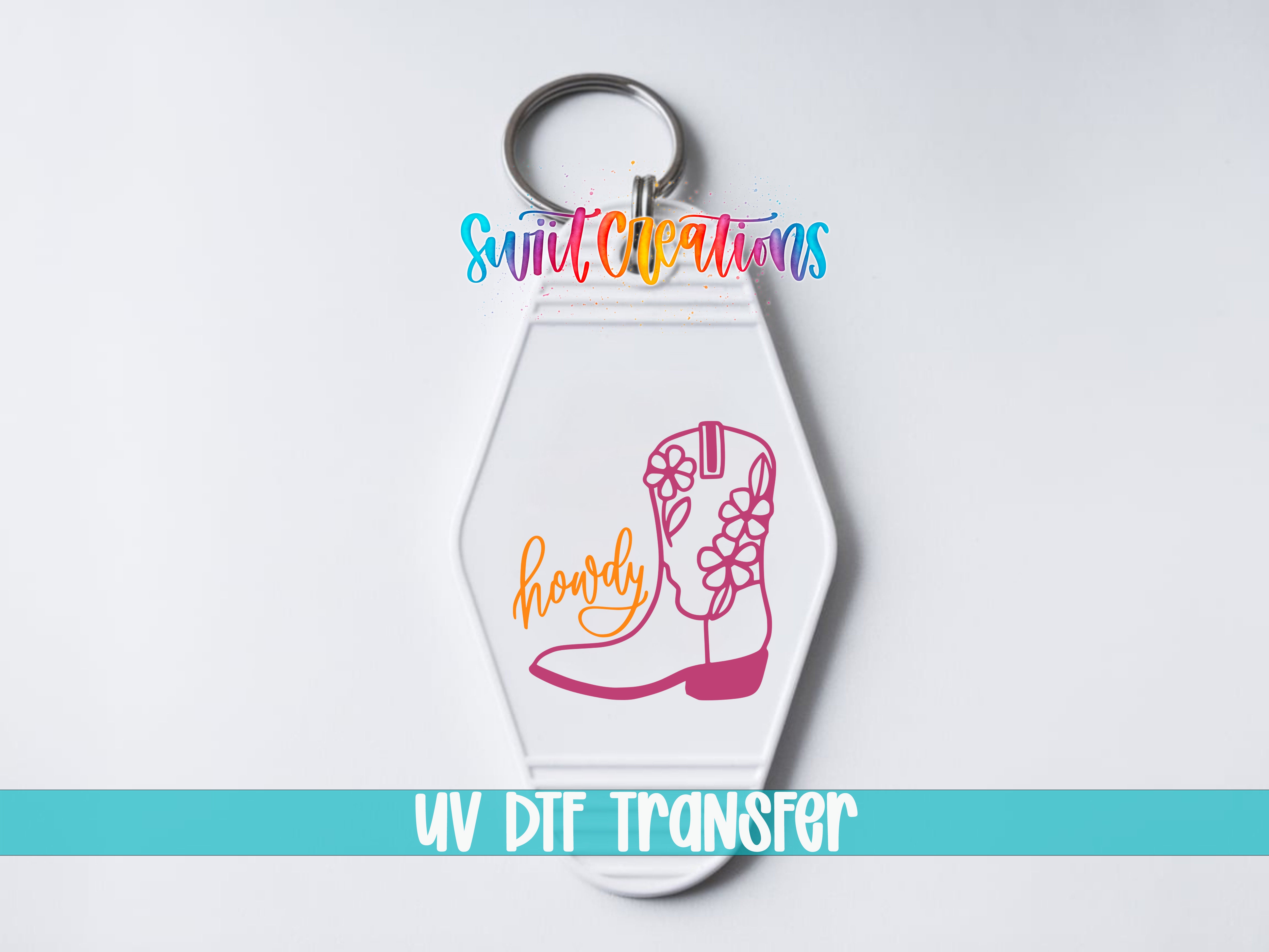 A keychain with a colorful design featuring a cowboy boot and the word "hurry" written on it.