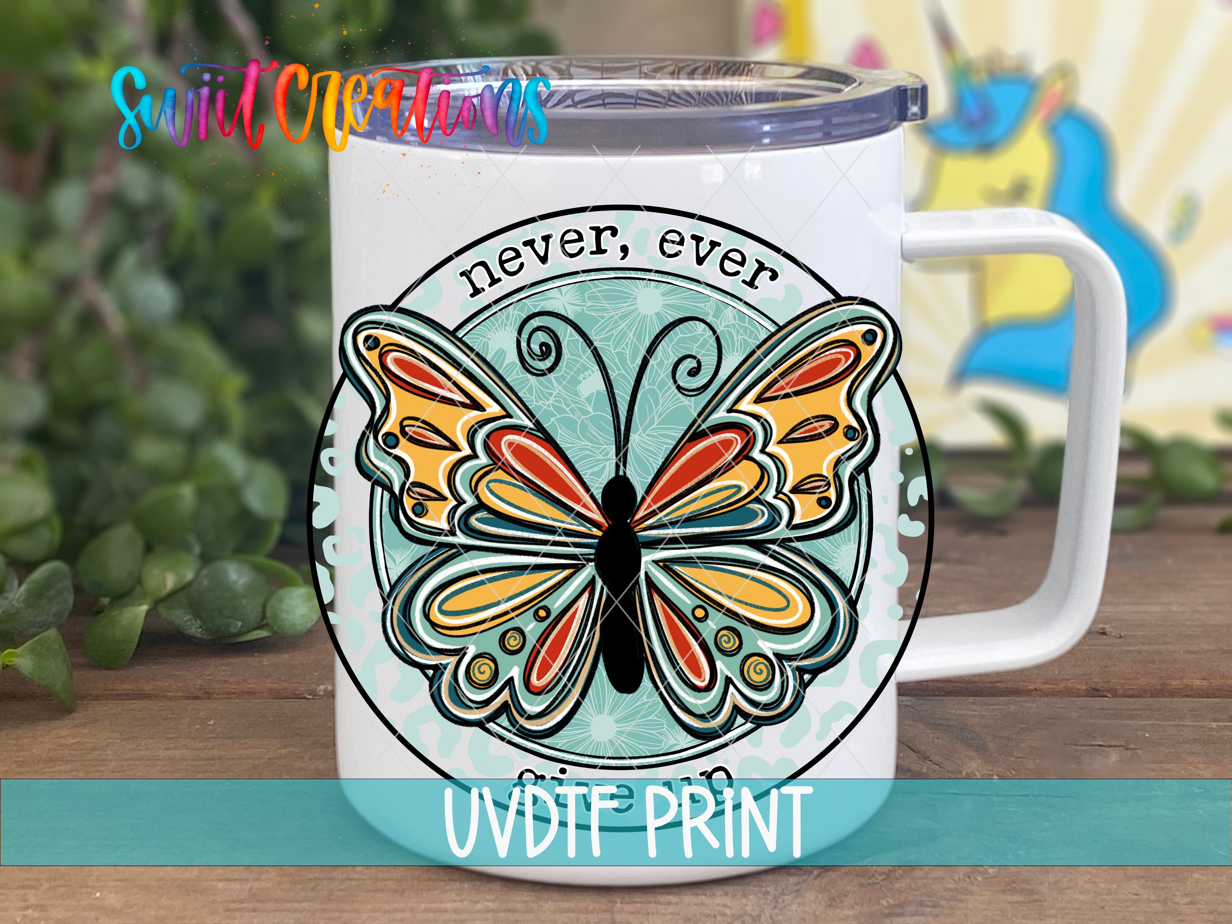 a white coffee mug with a colorful butterfly on it