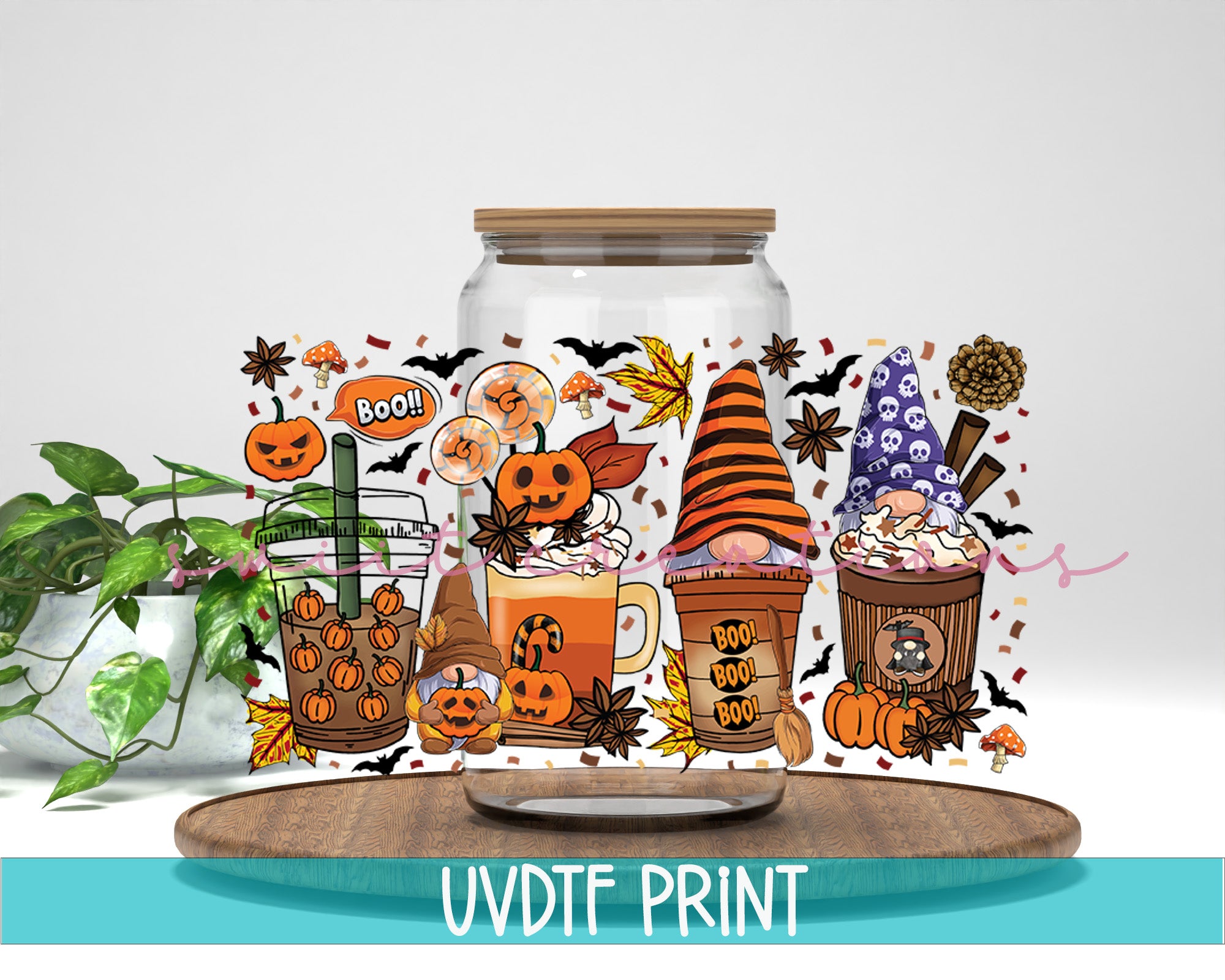 a glass jar filled with lots of halloween decorations