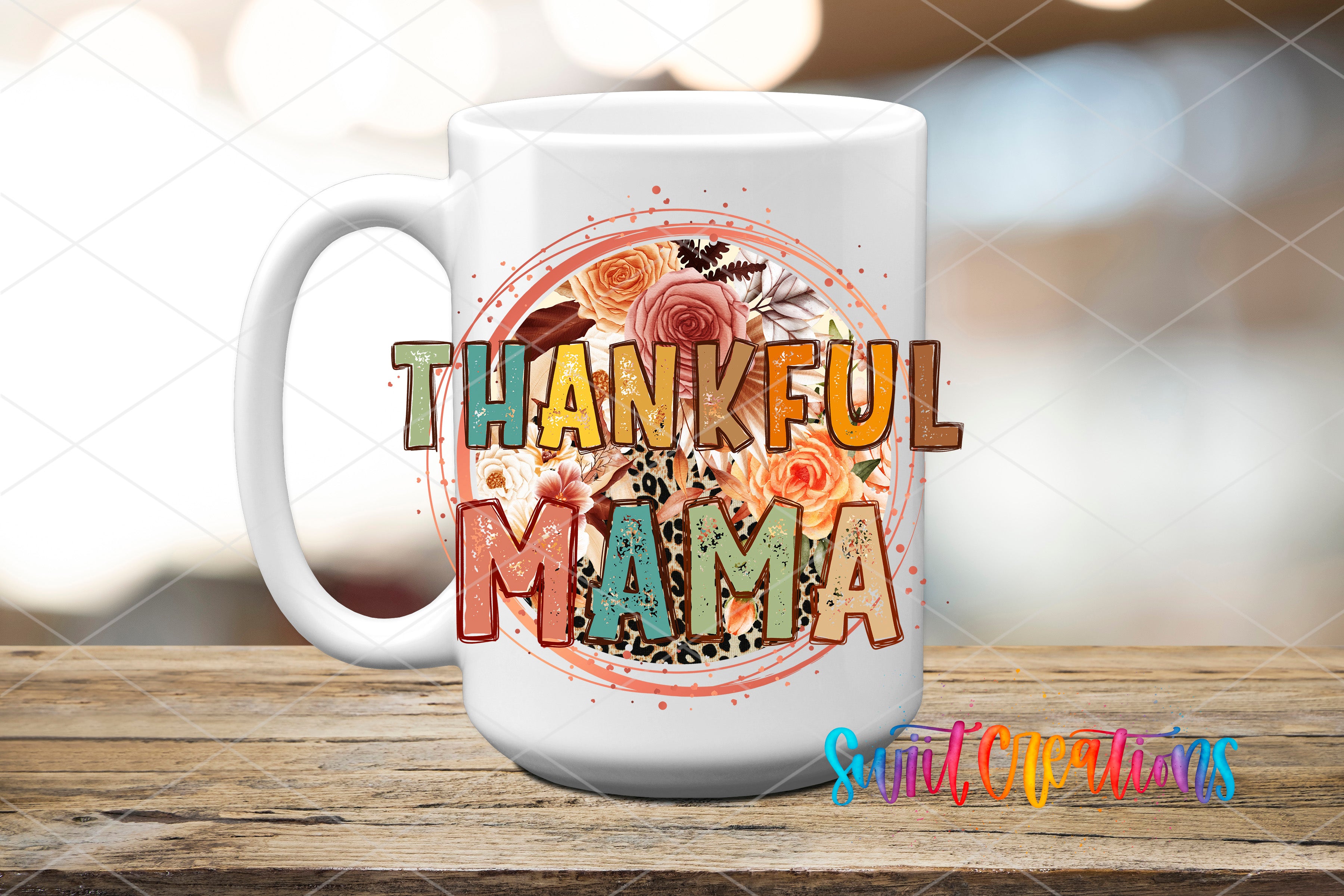 A white ceramic mug with a floral design and the text "THANKFUL MAMA" printed on it.