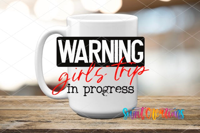 a coffee mug that says warning girls trip in progress