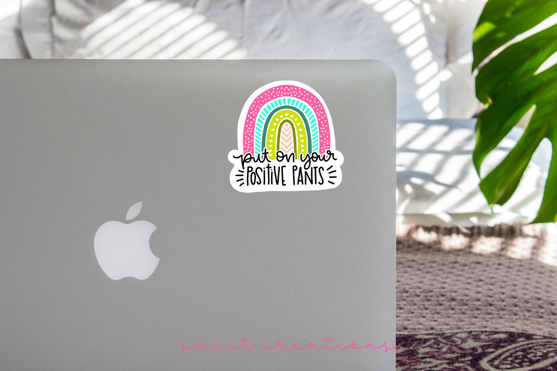 a laptop computer with a sticker on it