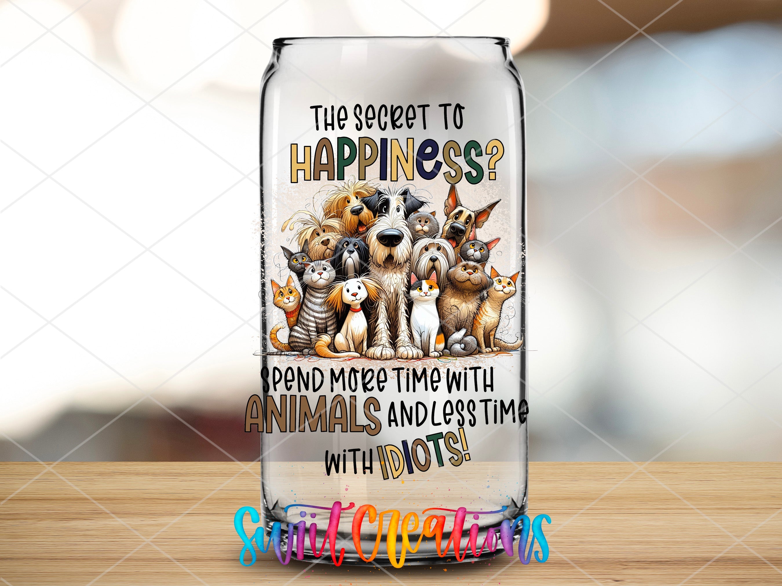 a glass bottle with a picture of dogs on it