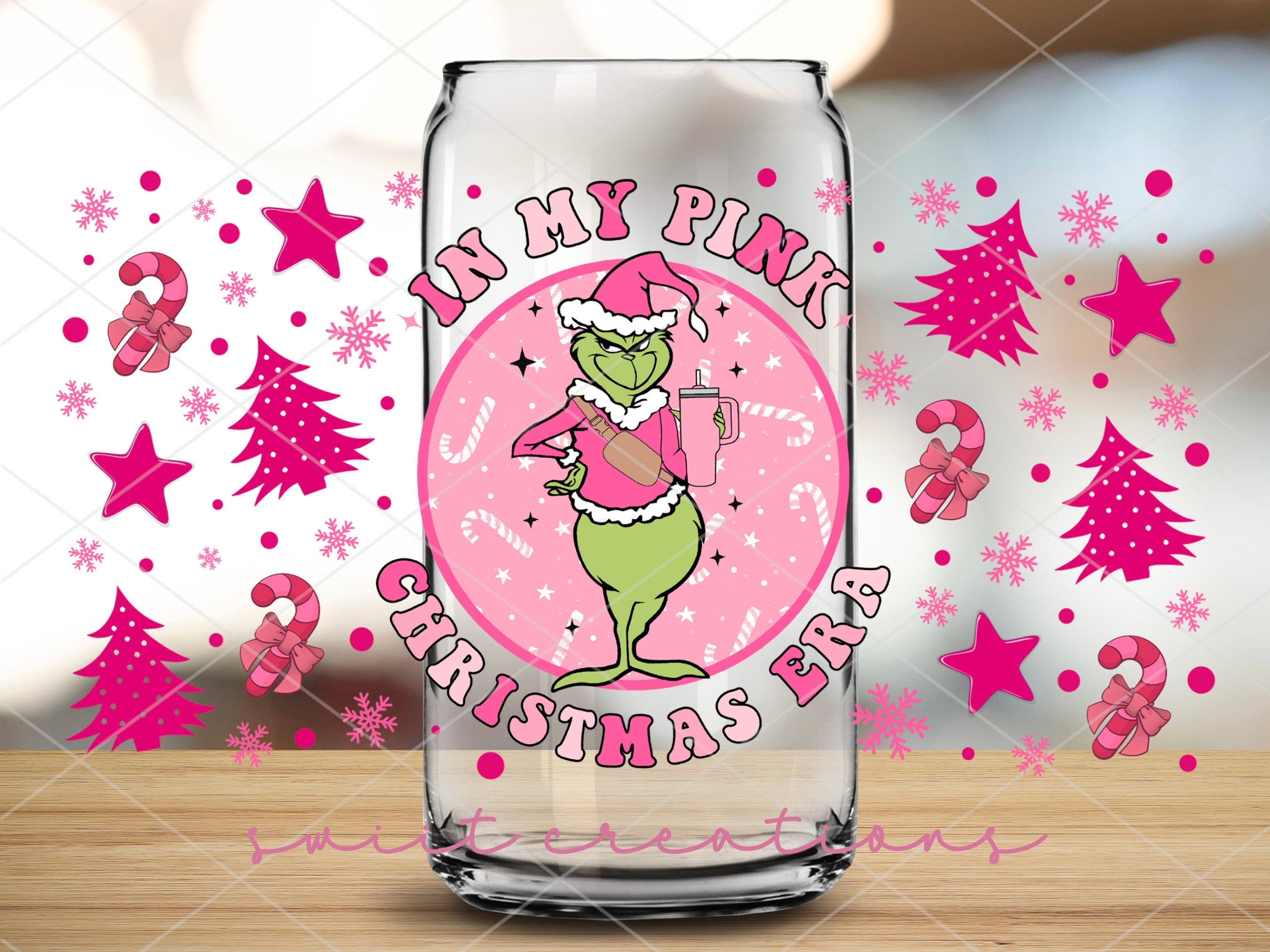a glass with a picture of the grin on it