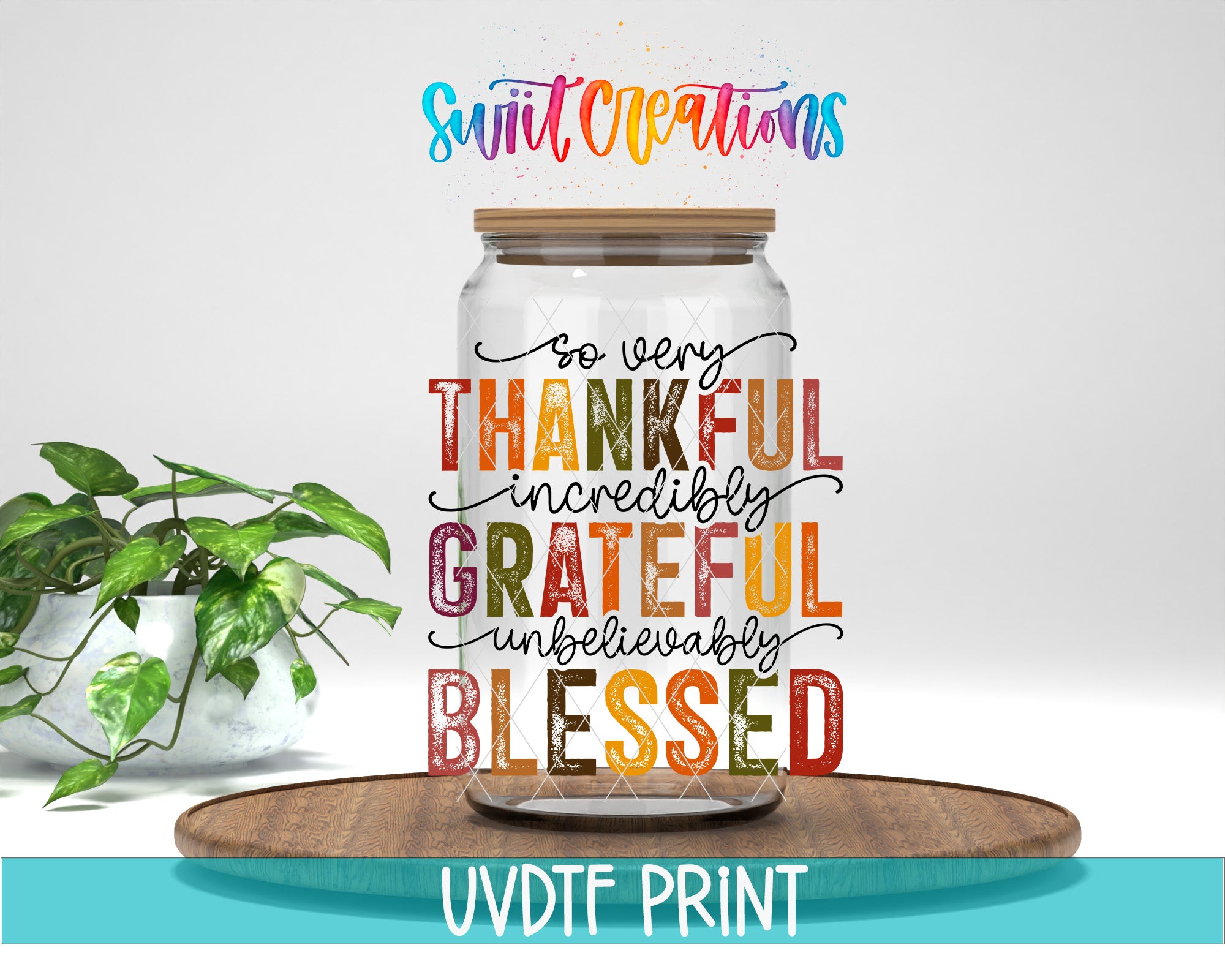 A glass jar with a wooden lid, filled with colorful text that says "So very THANKFUL incredibly GRATEFUL undoubtedly BLESSED" in a vibrant, hand-lettered style. The jar is placed on a wooden surface, and there is a potted plant in the background.