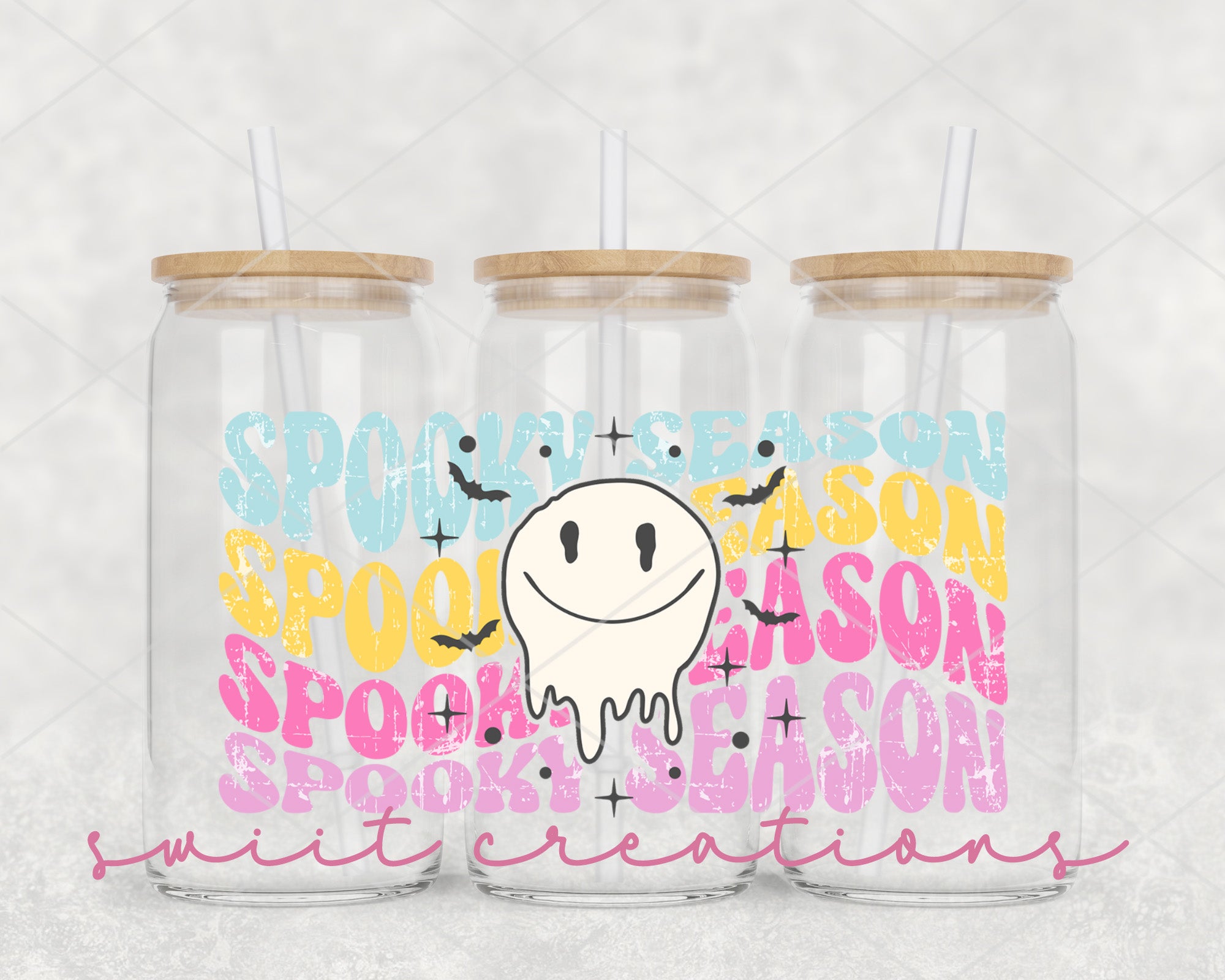a couple of glass cups with straws in them