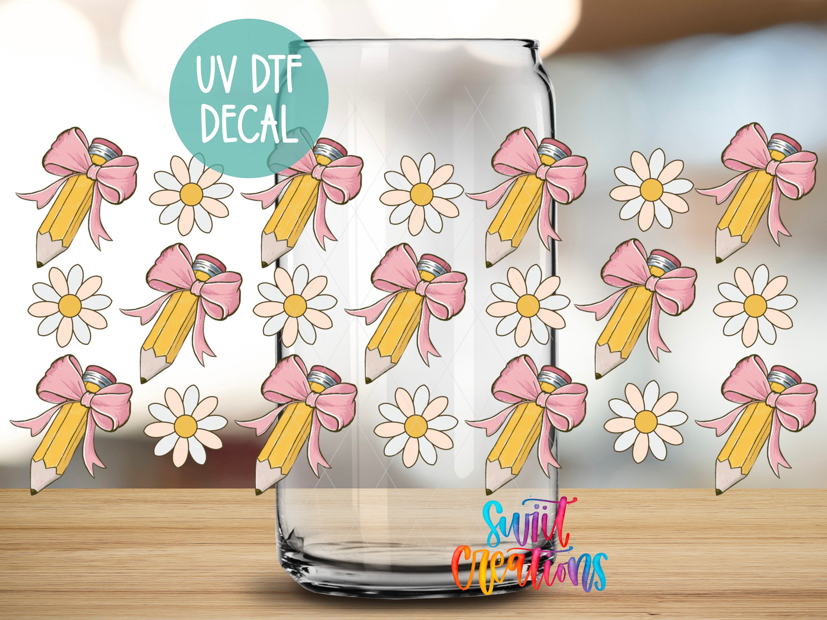 a clear glass jar with a pattern of pink and yellow pencils with bows on a wooden surface.