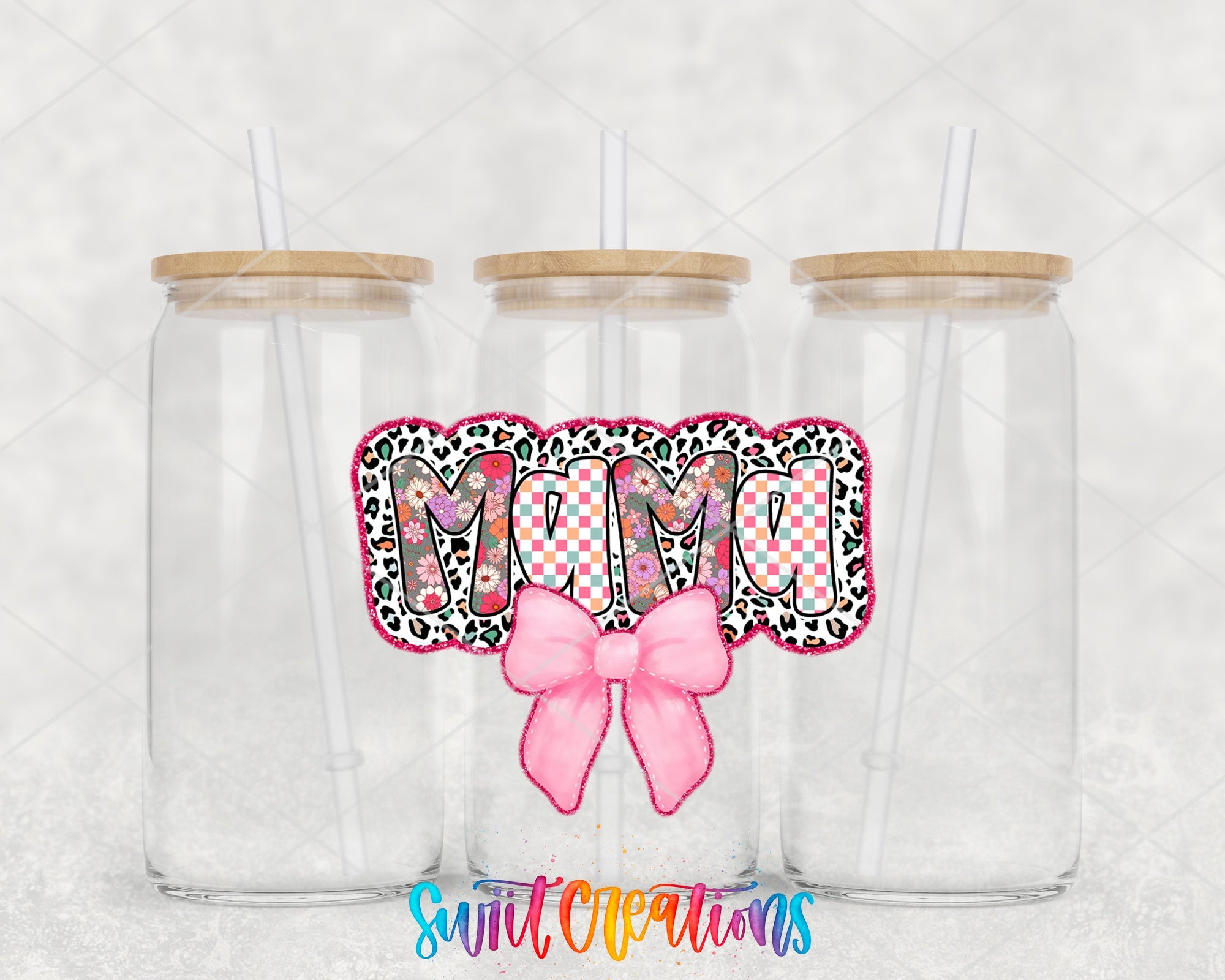 two clear tumblers with a pink bow on the side