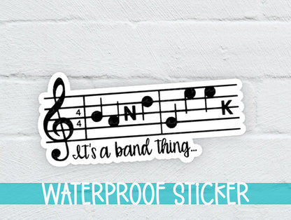 a waterproof sticker with a musical note on it