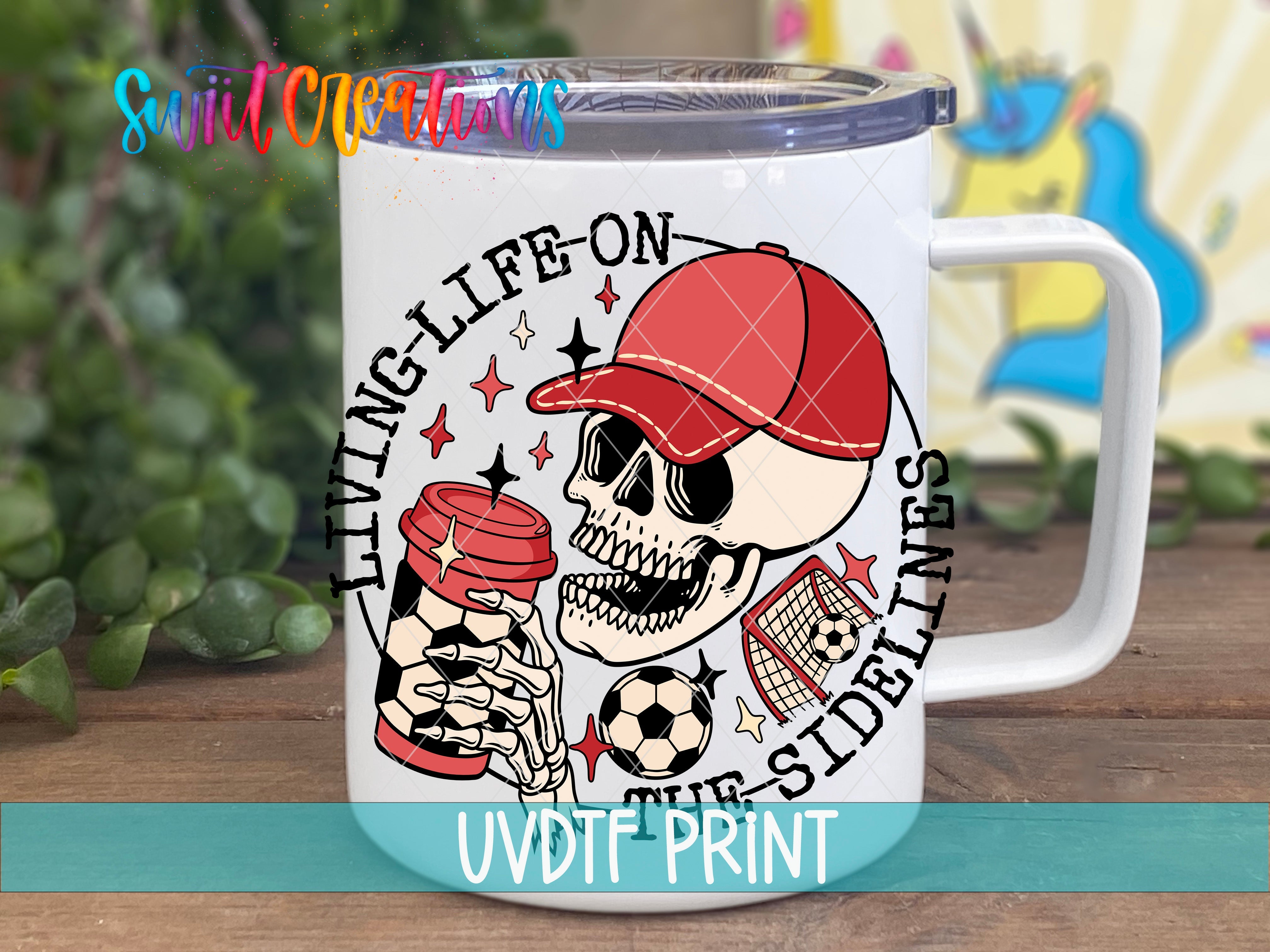 a white coffee mug with a skull holding a cup