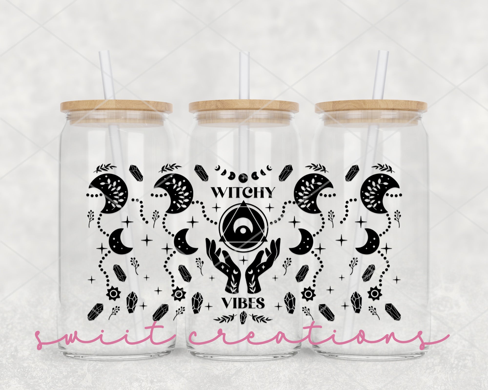 a couple of mason jars sitting on top of a table