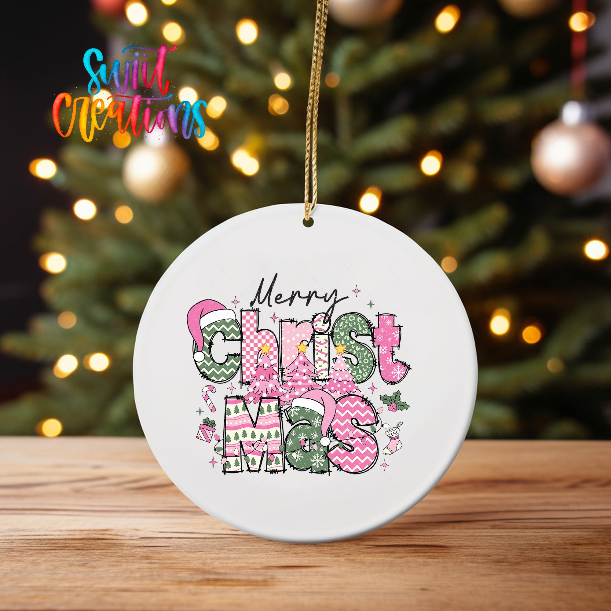 A white Christmas ornament with the text "Merry Christmas" and various Christmas-themed graphics and decorations.
