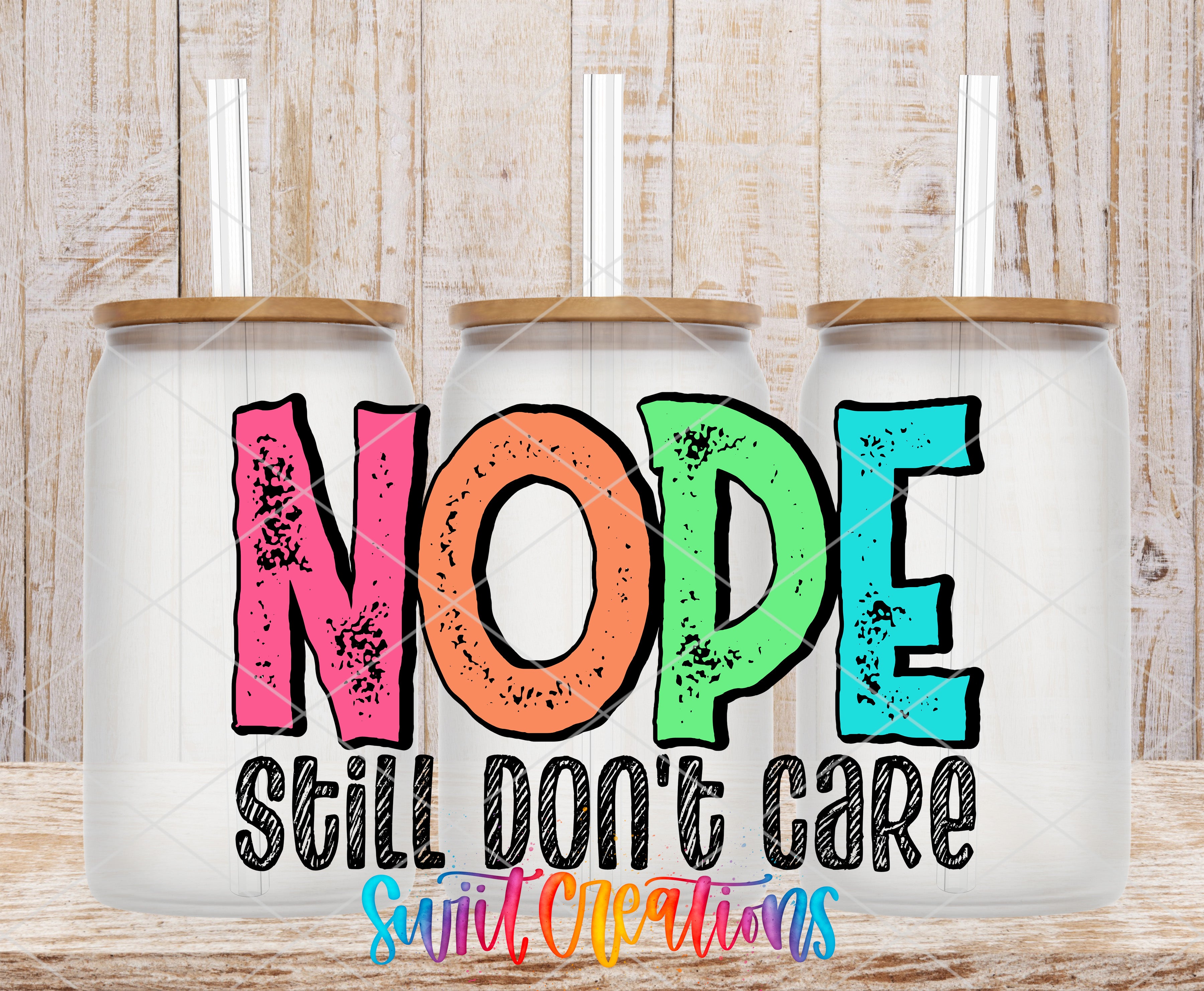 three glass jars with lids, each containing a straw, and the text "NOPE STILL DON'T CARE" written on them.