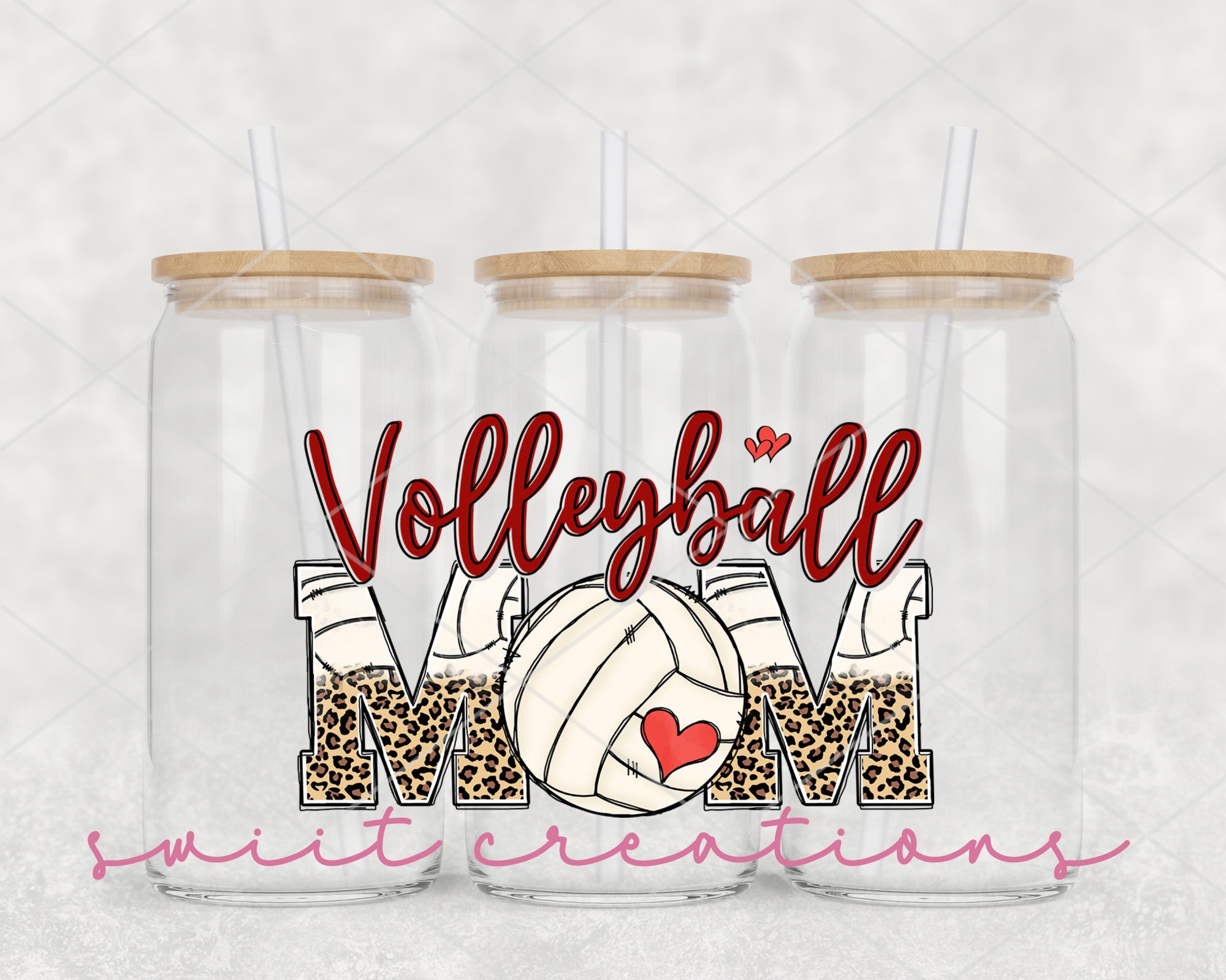 two clear tumblers with volleyball mom on them