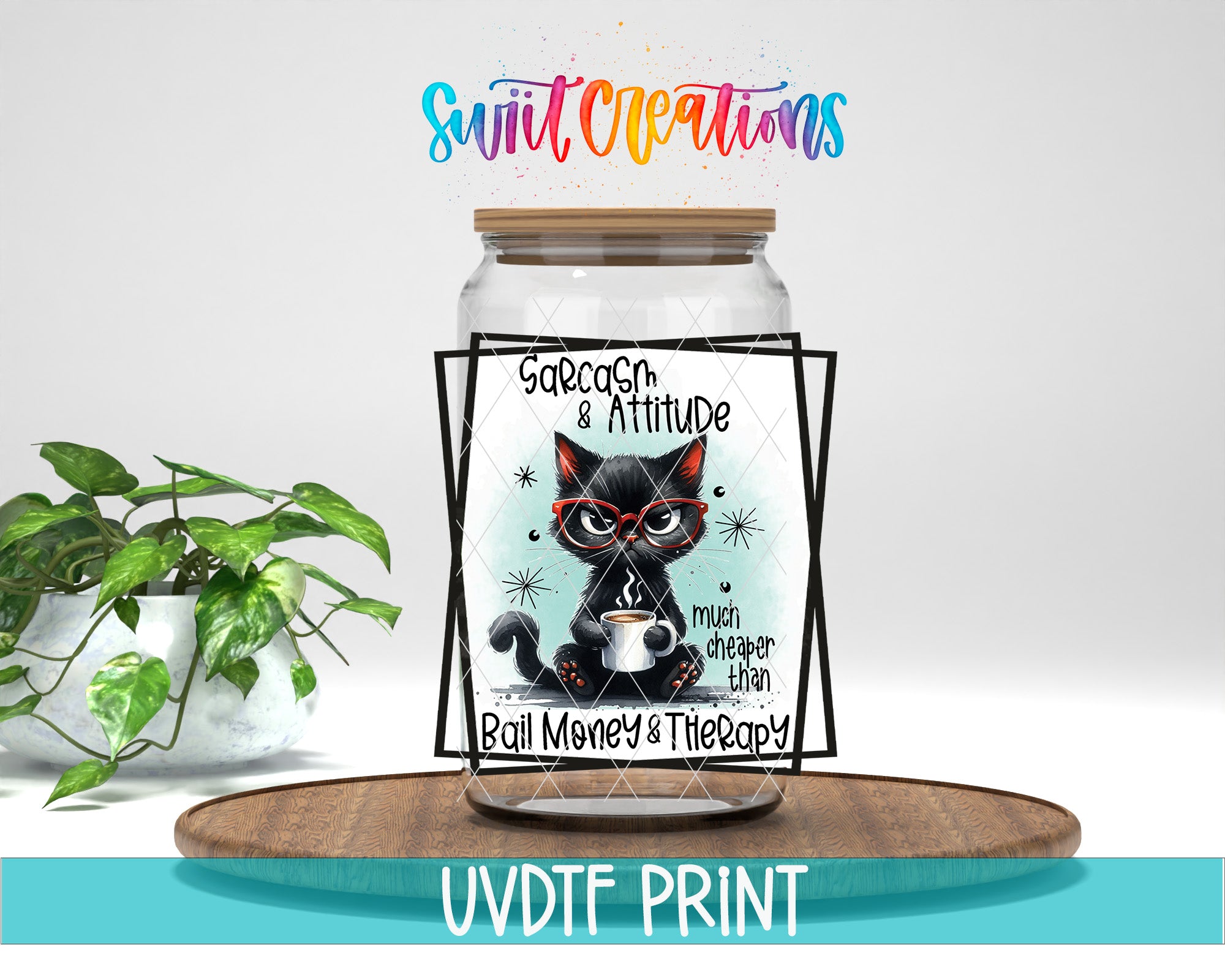 A jar with a cat illustration and text, placed on a wooden surface next to a potted plant.