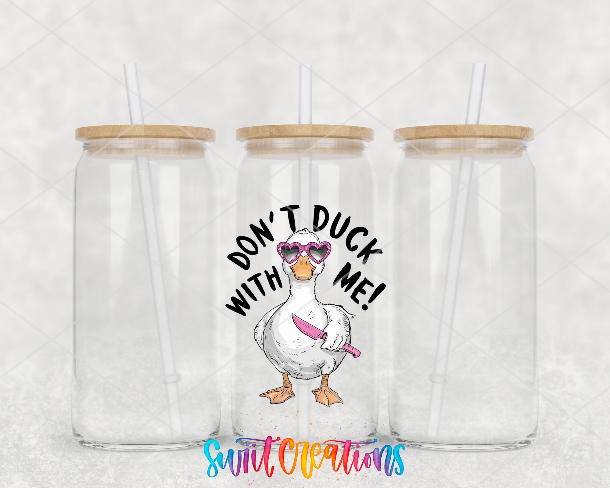a couple of clear cups with a duck on them