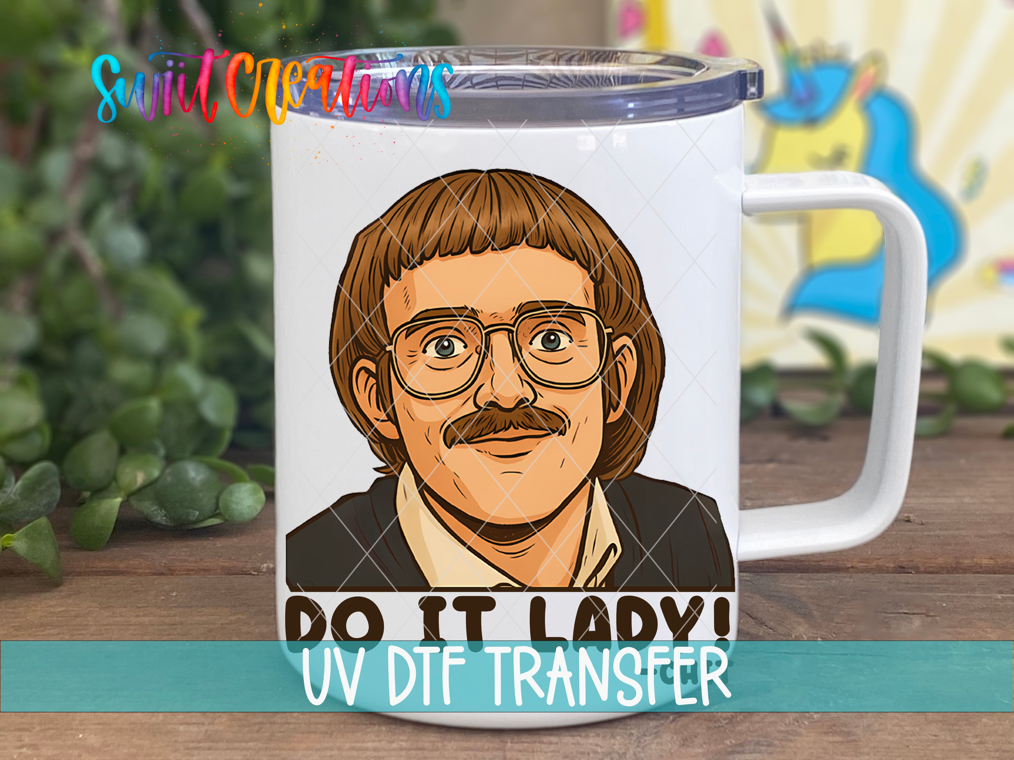 A mug with a cartoon illustration of a man with glasses and a mustache, along with the text "Do it lady!" and "UVDF Transfer" printed on it.