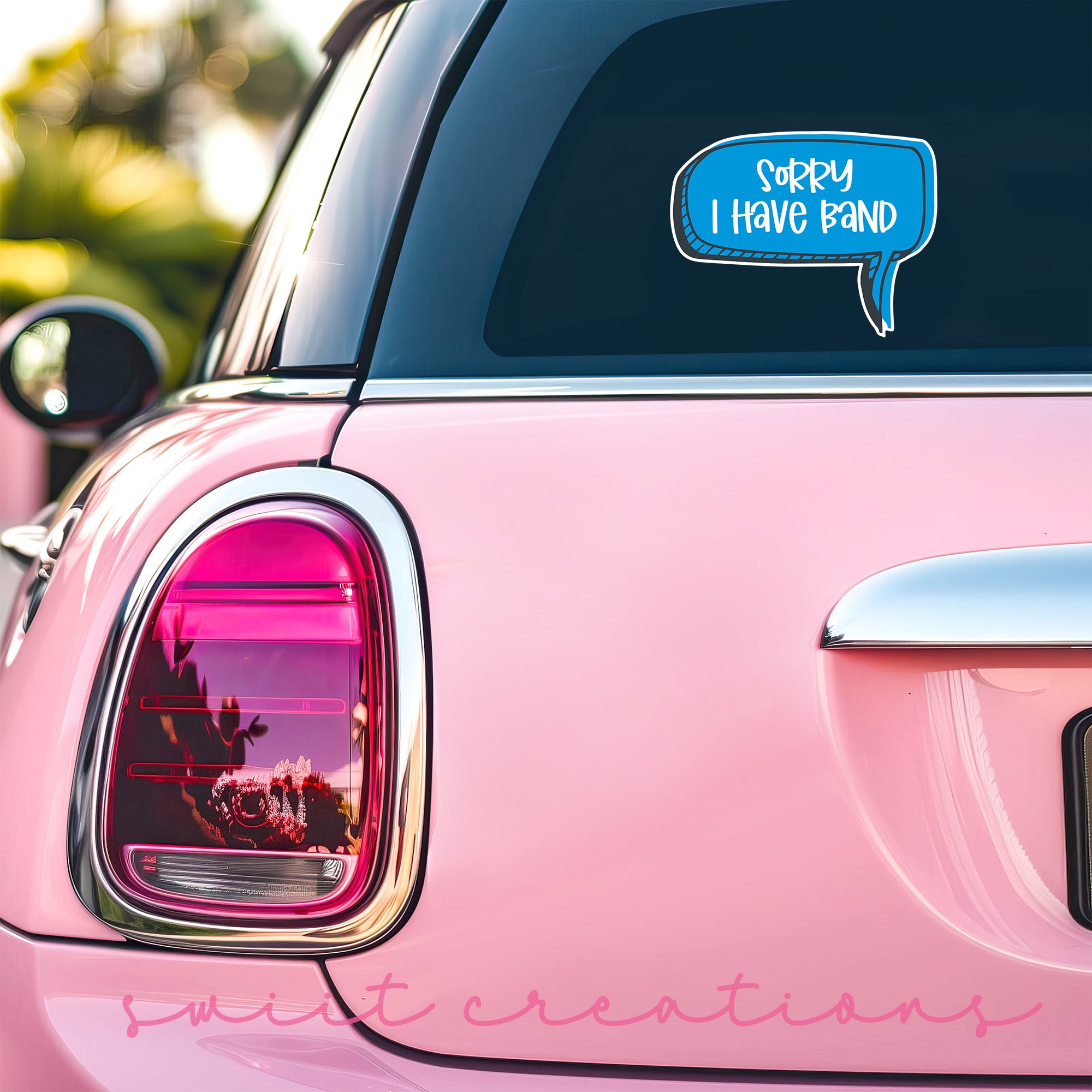 a pink car with a speech bubble on it