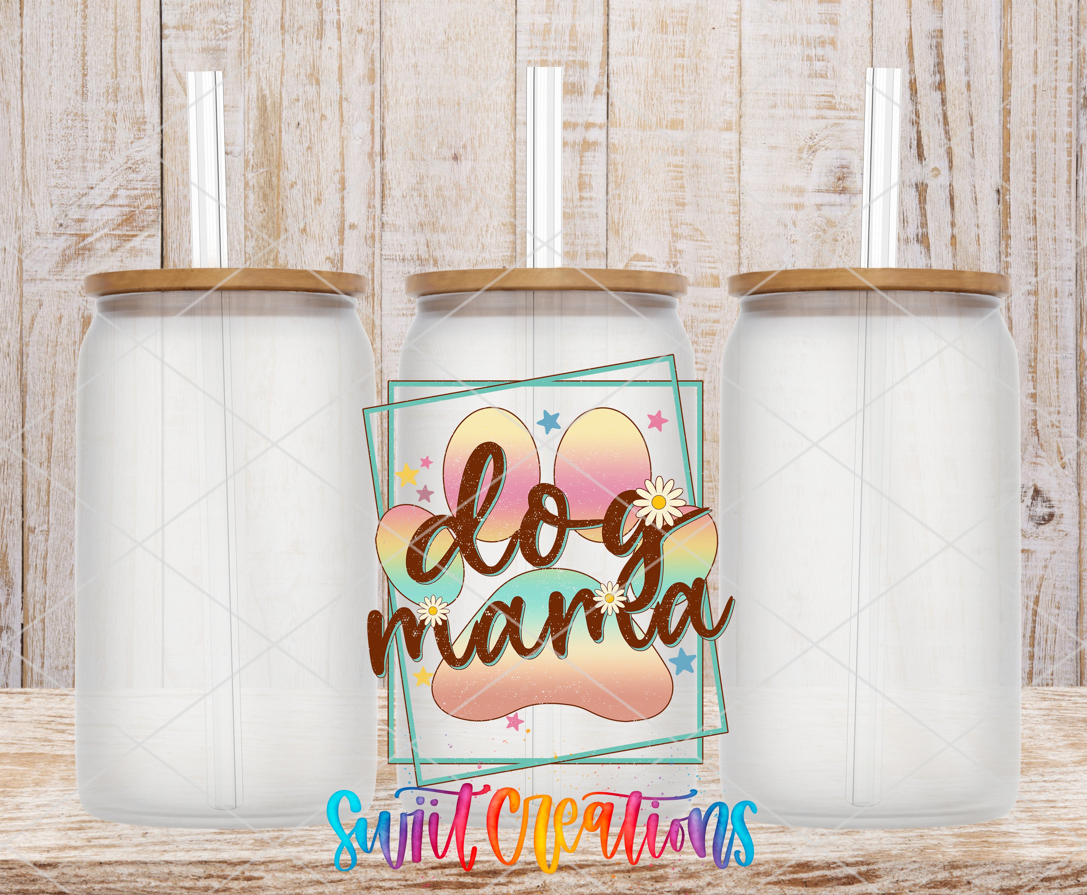three clear glass jars with lids, arranged in a row against a wooden background. The jars have a colorful design with a paw print and flowers on them. The text "dog mama" is displayed prominently in the center of the image.