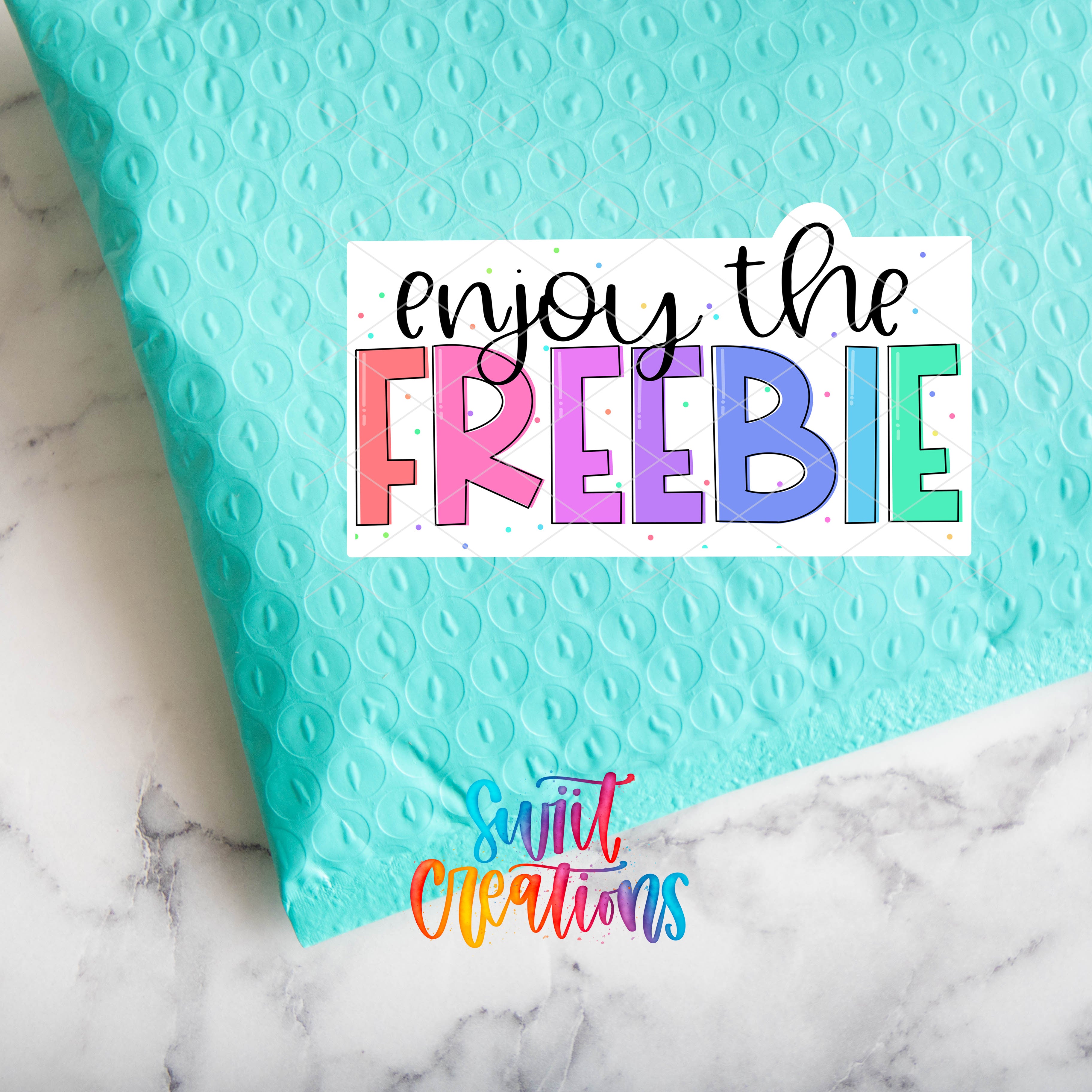 a blue envelope with the words enjoy the freebie on it