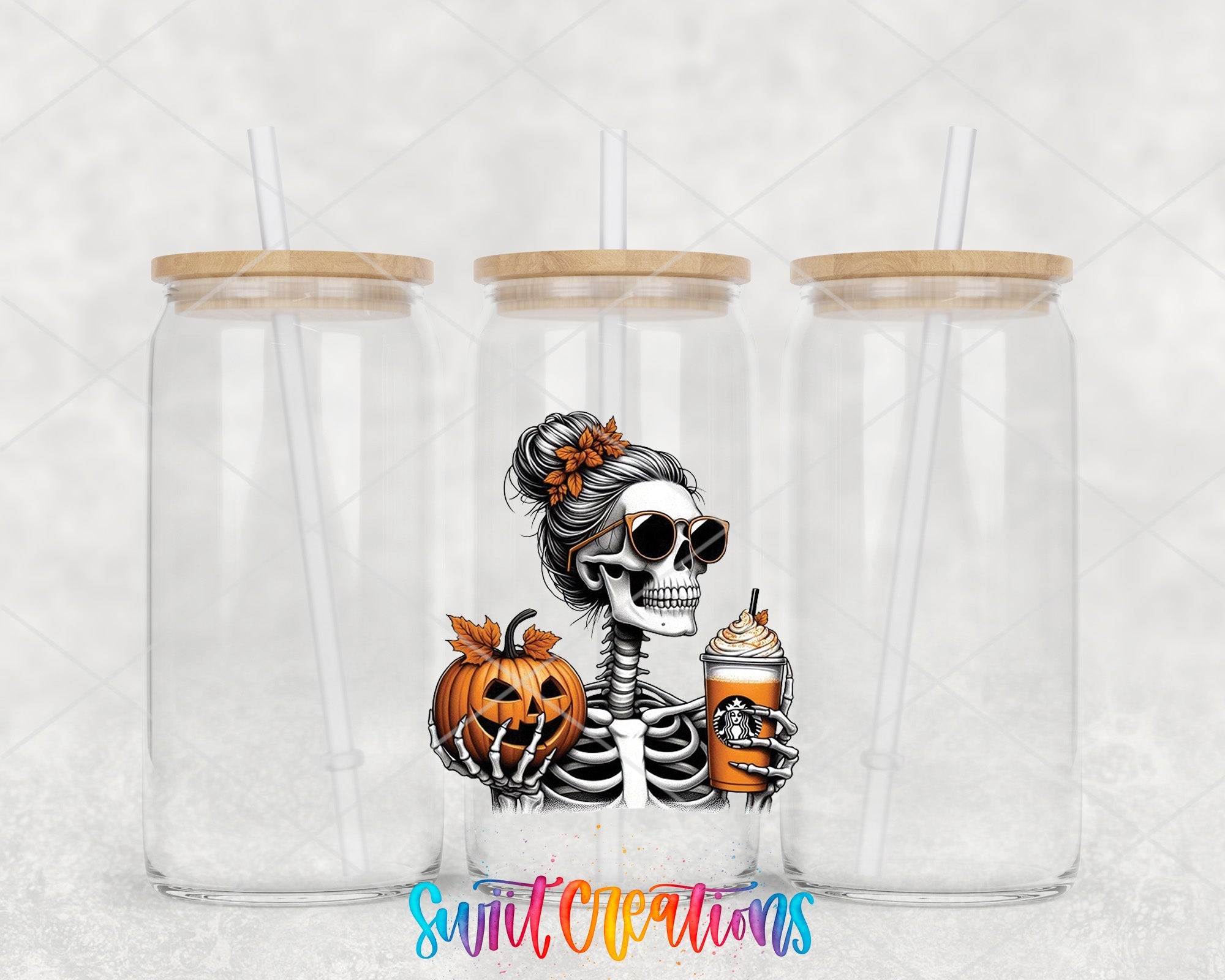 a couple of glasses with a skeleton on them