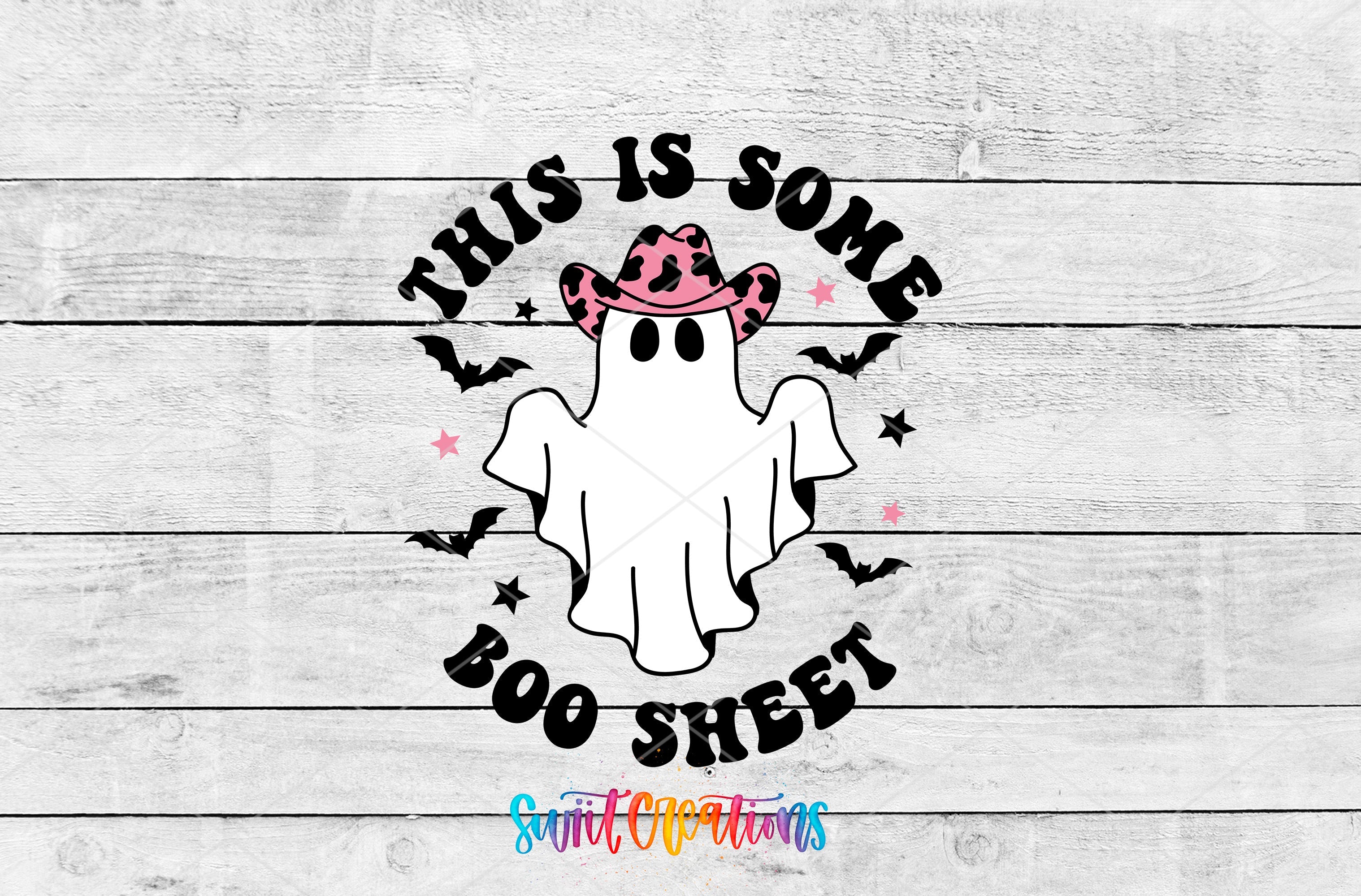 a white ghost with a pink hat and bats on it